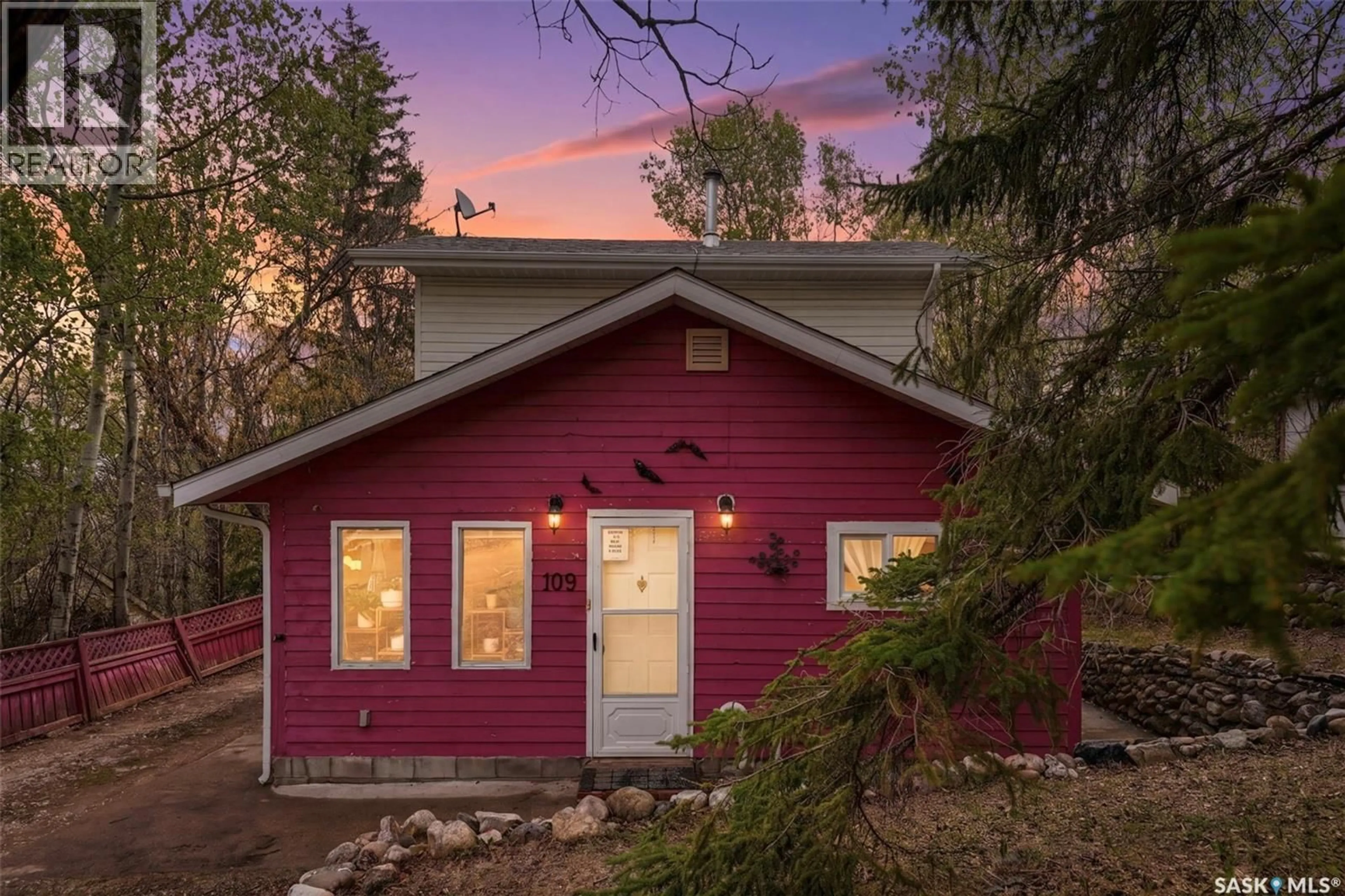 Home with vinyl exterior material, street for 107-109 SHAWONDASSE DRIVE, Manitou Beach Saskatchewan S0K4T1