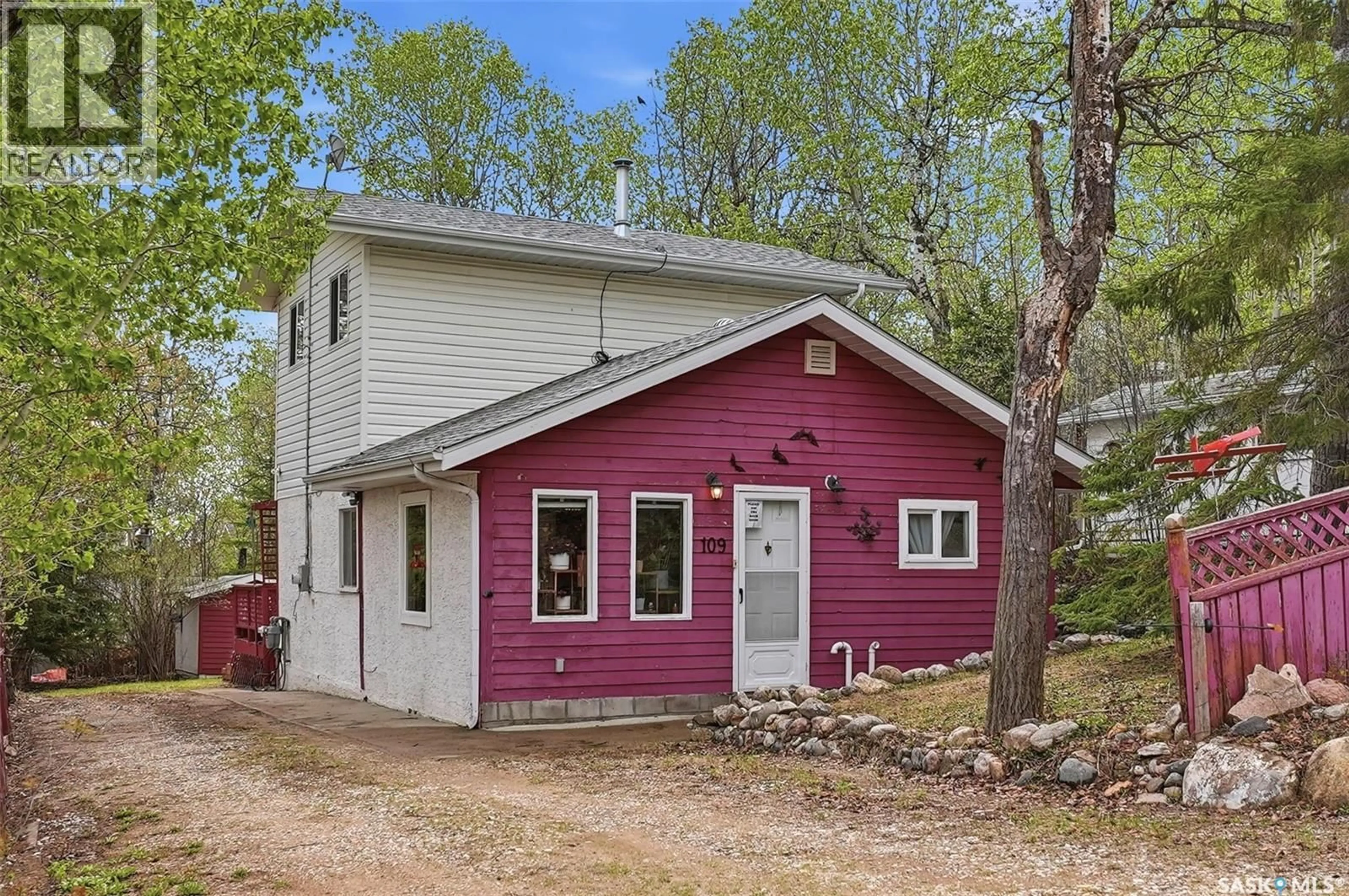 Home with vinyl exterior material, street for 107-109 SHAWONDASSE DRIVE, Manitou Beach Saskatchewan S0K4T1