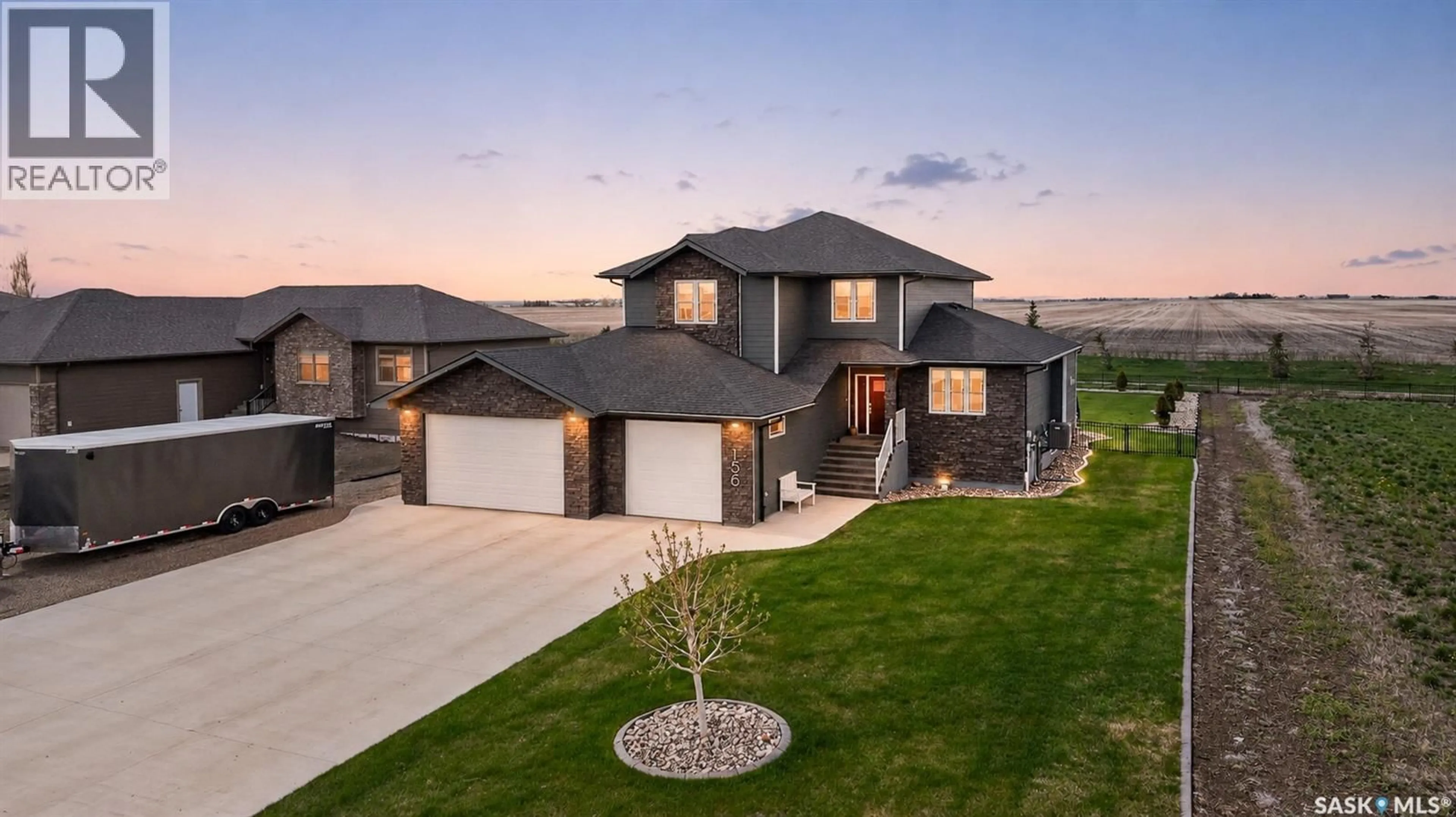 Home with brick exterior material, street for 156 IRON BRIDGE DRIVE, Moose Jaw Saskatchewan S6J0B4