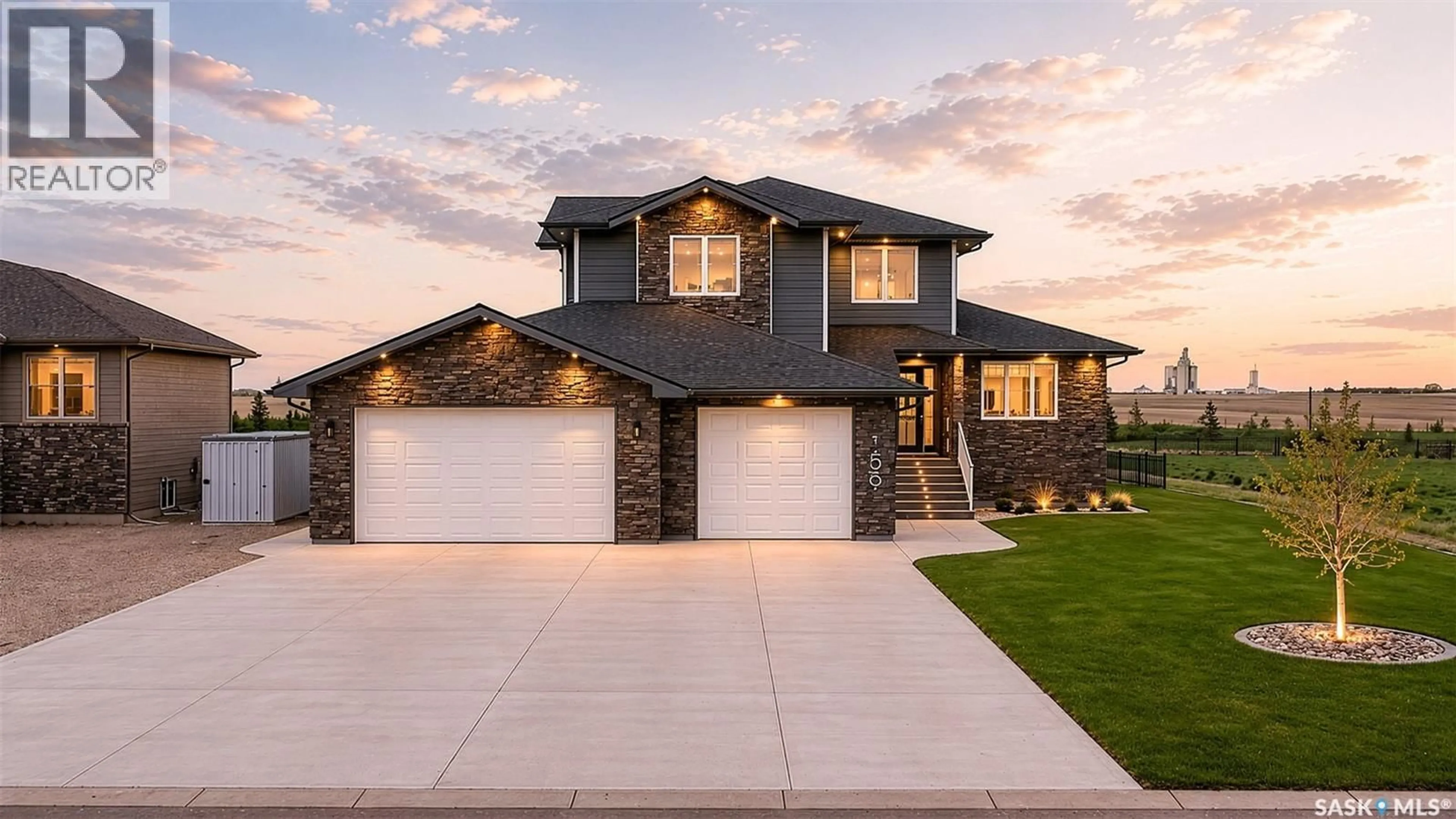Home with brick exterior material, street for 156 IRON BRIDGE DRIVE, Moose Jaw Saskatchewan S6J0B4