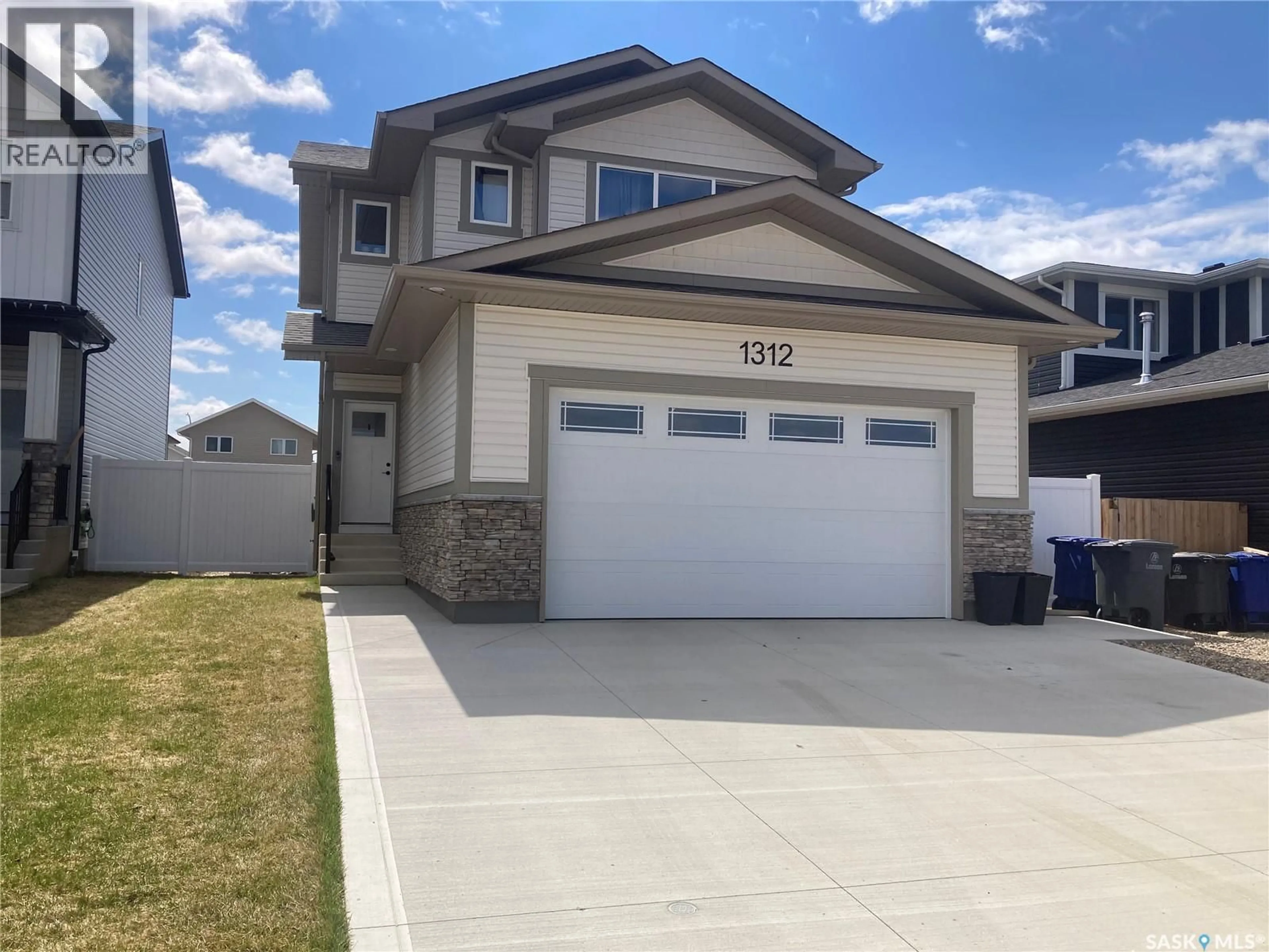 Home with vinyl exterior material, street for 1312 PARR HILL DRIVE, Martensville Saskatchewan S0K2T1