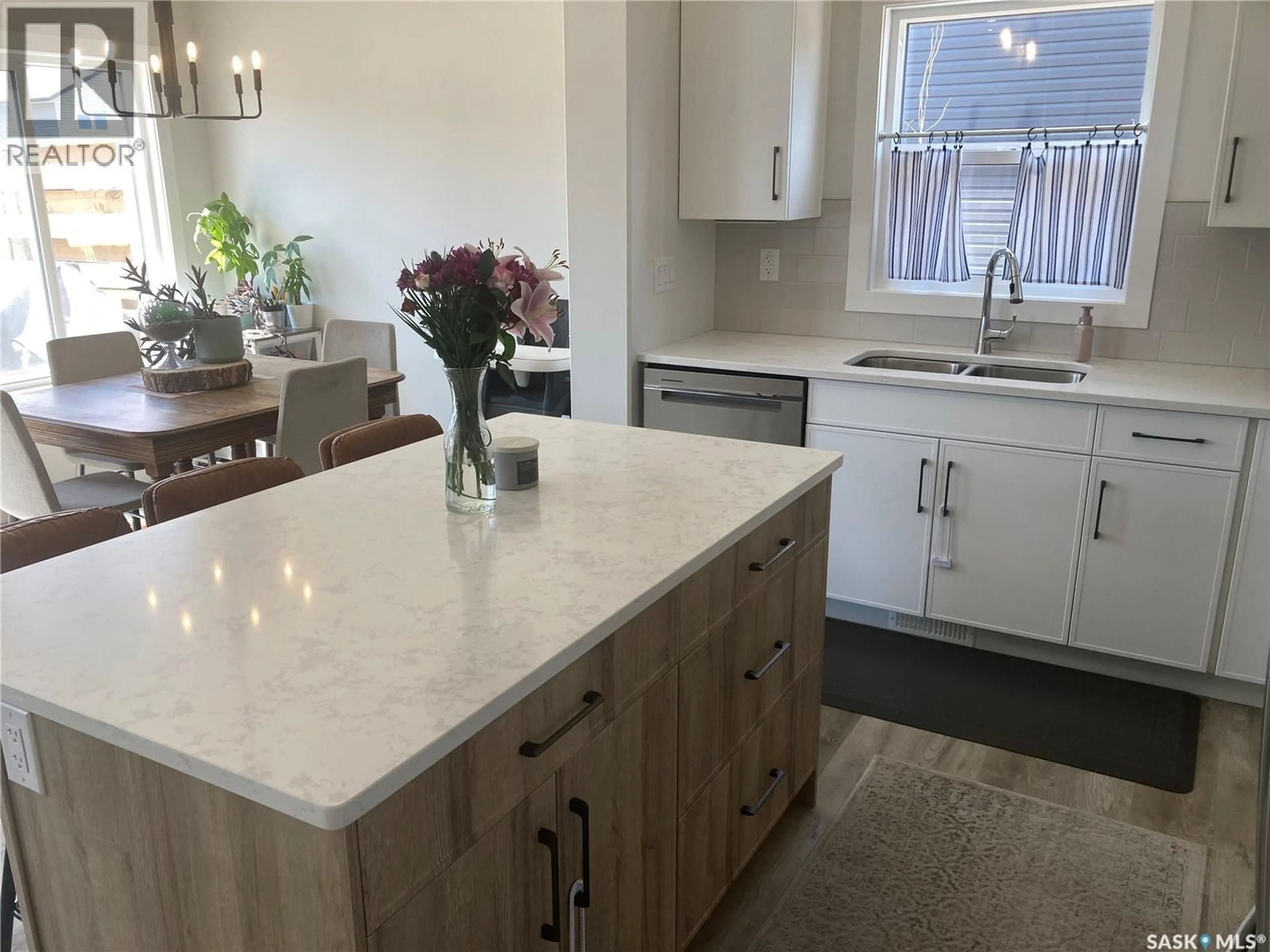 Open concept kitchen, ceramic/tile floor for 1312 PARR HILL DRIVE, Martensville Saskatchewan S0K2T1