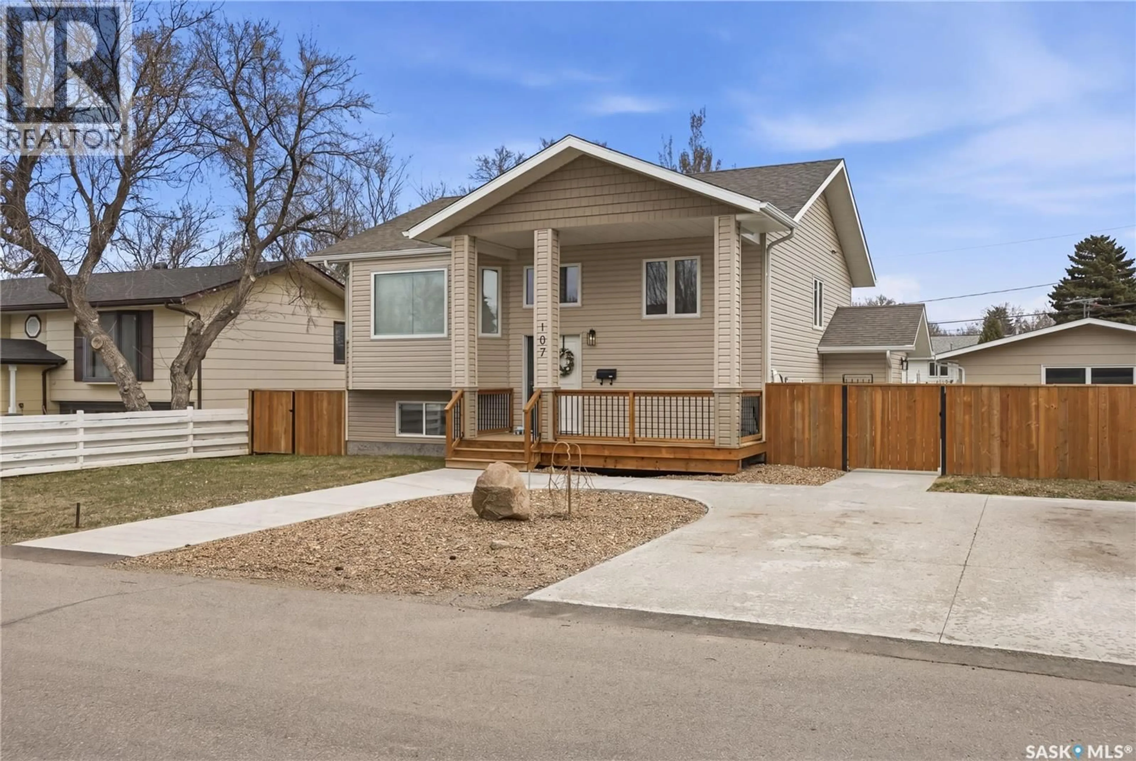 Home with vinyl exterior material, street for 107 VALLEYVIEW DRIVE, Caronport Saskatchewan S0H0S0
