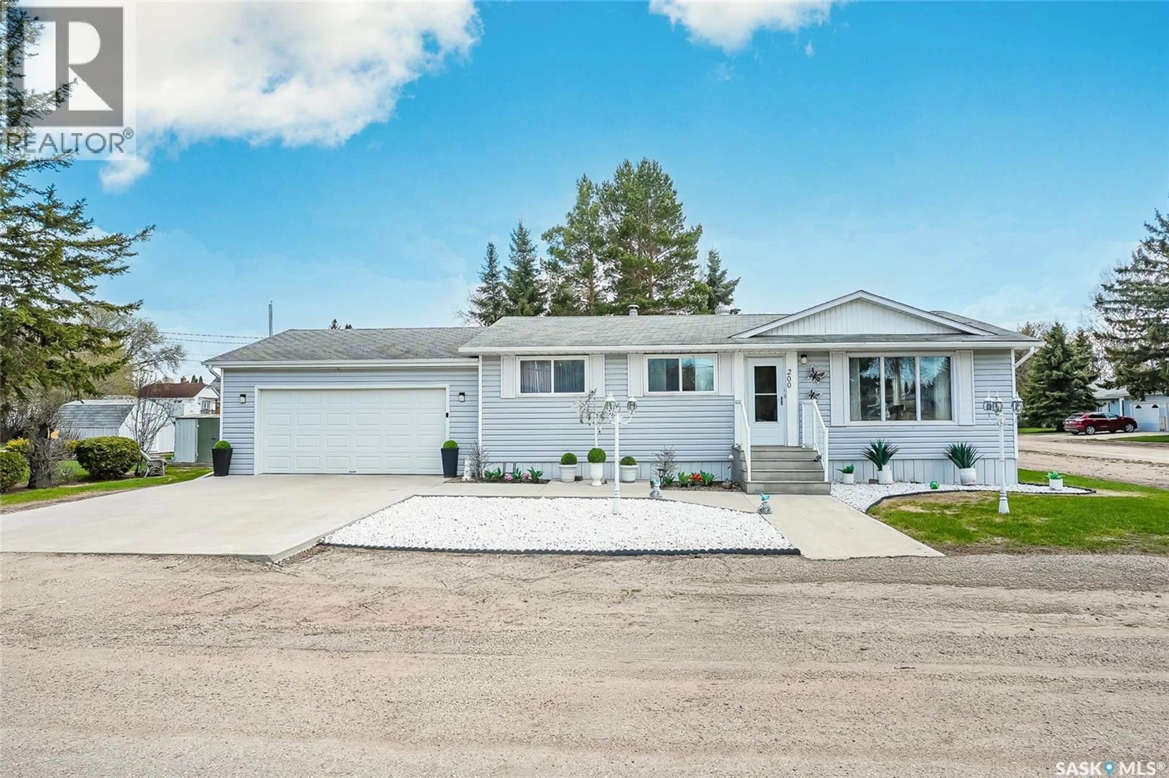 Home with vinyl exterior material, street for 200 BUFFER AVENUE, Vonda Saskatchewan S0K4N0