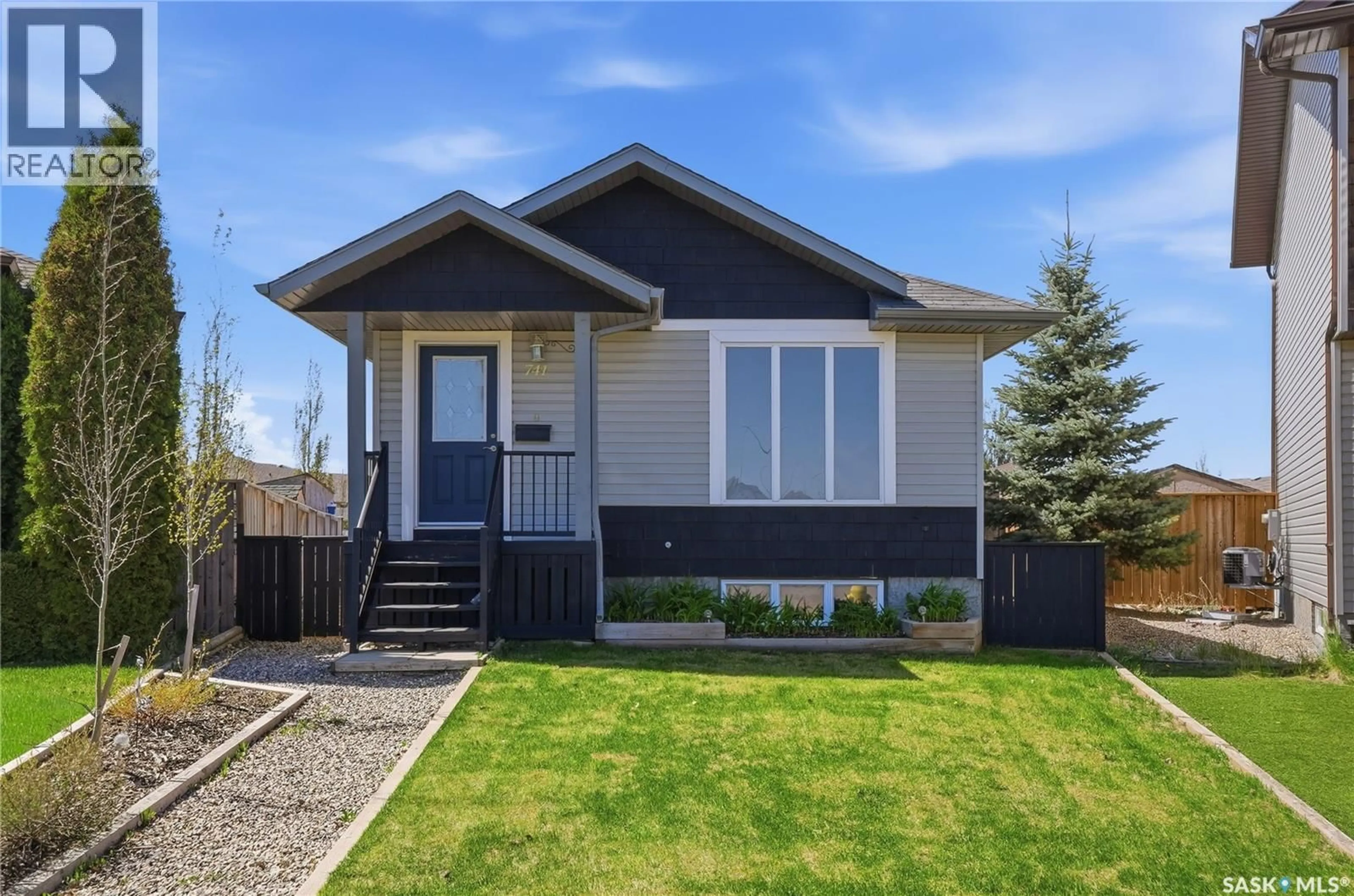Home with vinyl exterior material, street for 741 GLENVIEW COVE, Martensville Saskatchewan S0K0A2