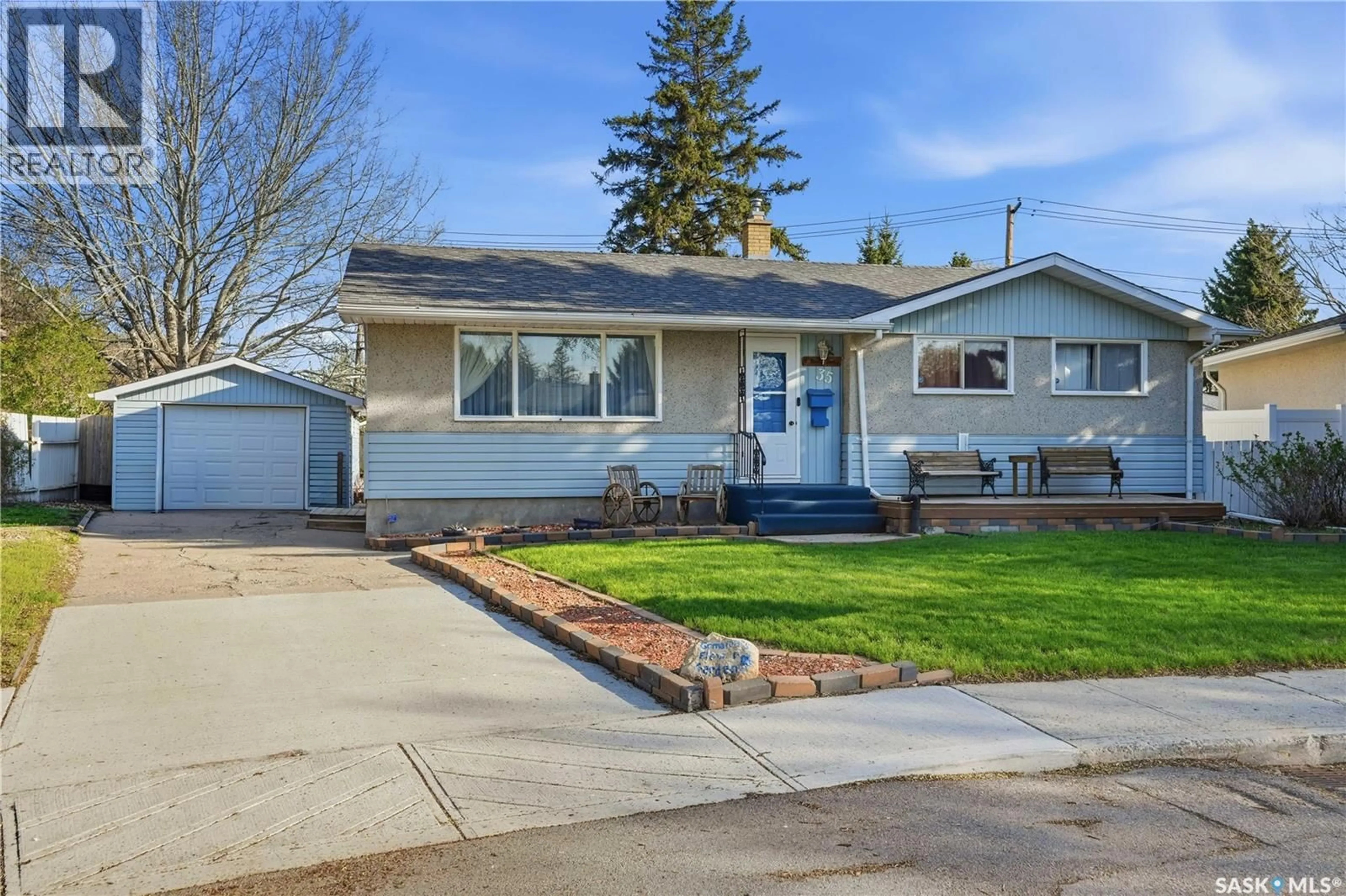Home with vinyl exterior material, street for 35 MCINNIS CRESCENT, Regina Saskatchewan S4R3E7