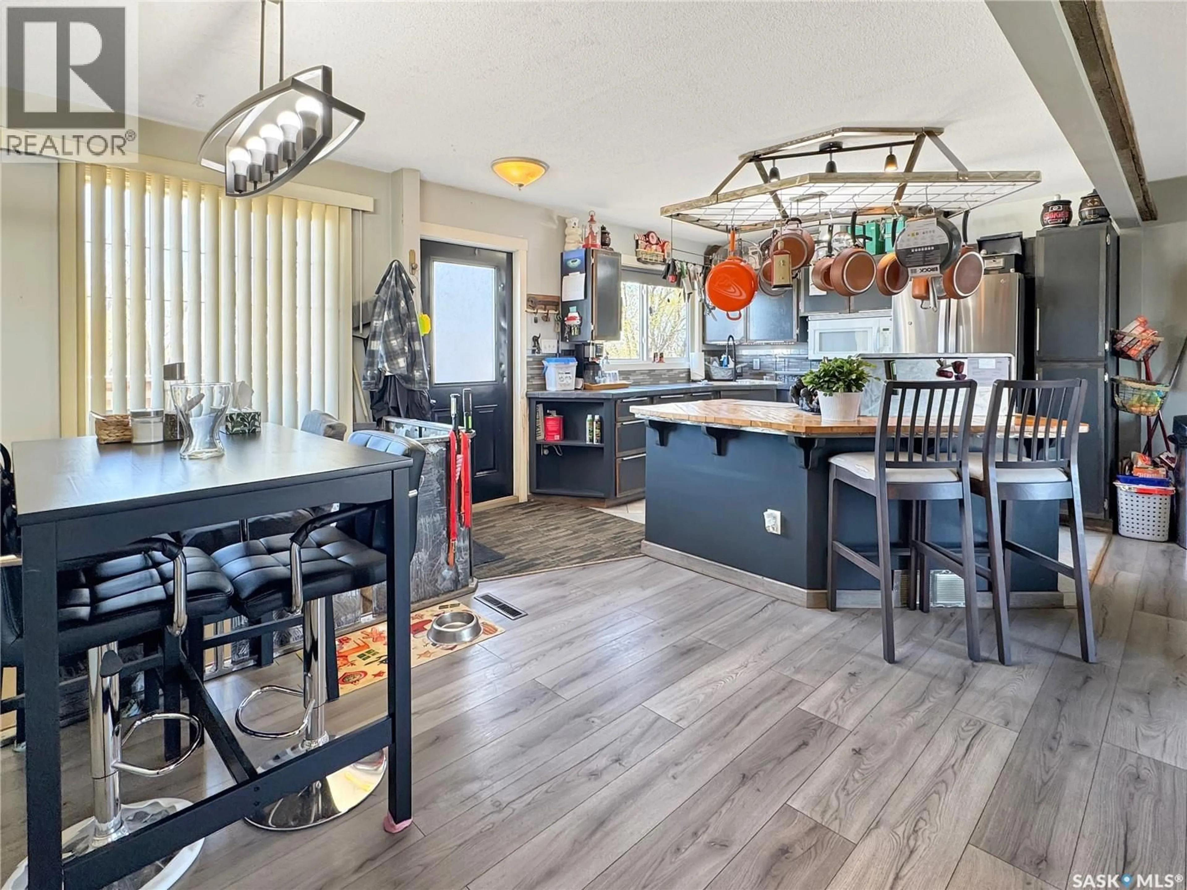 Open concept kitchen, wood/laminate floor for CHMELYNK ACREAGE, Battle River Rm No. 438 Saskatchewan S0M0E0