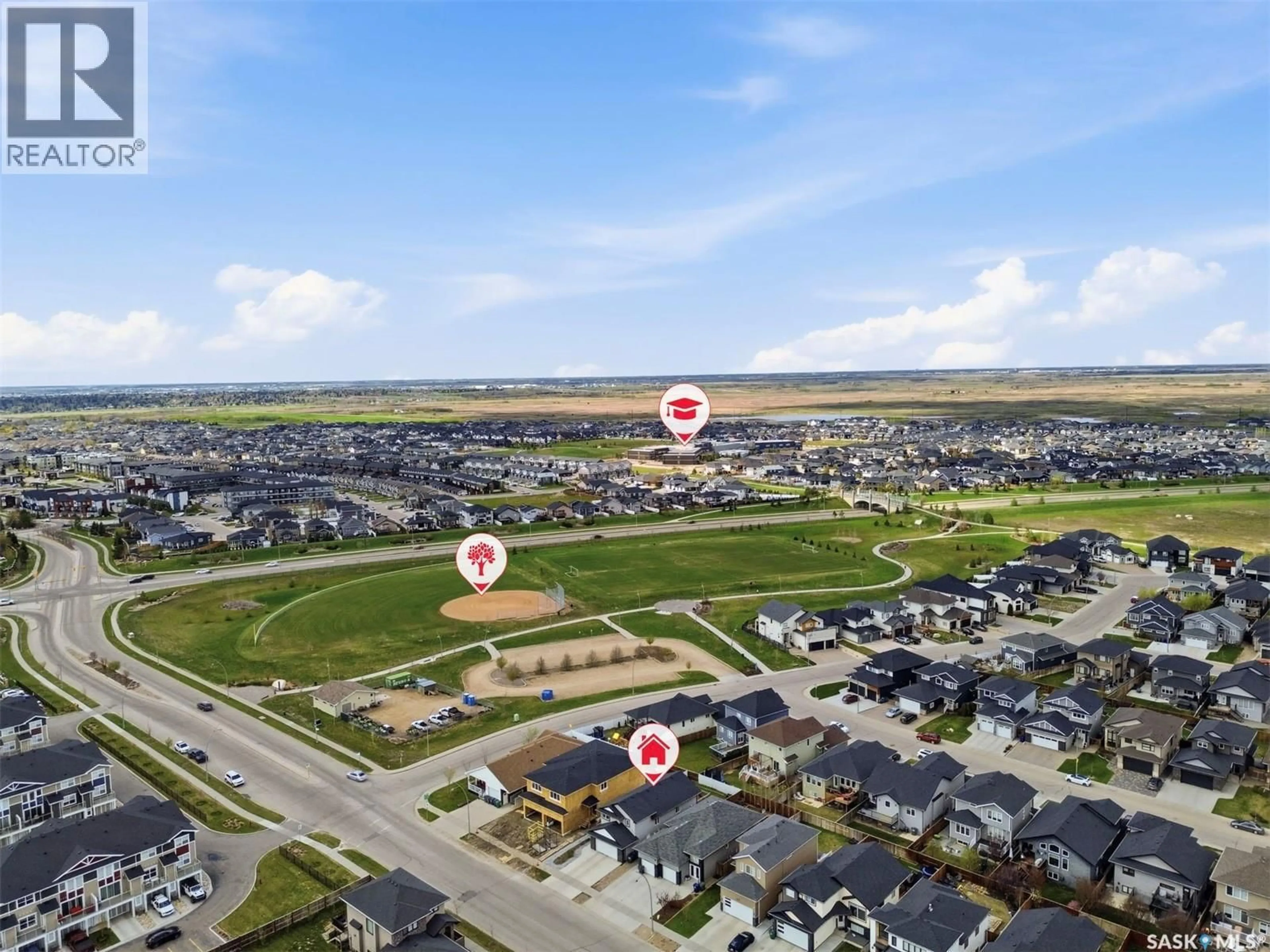 A pic from outside/outdoor area/front of a property/back of a property/a pic from drone, unknown for 211 BALTZAN BOULEVARD, Saskatoon Saskatchewan S7W0S2