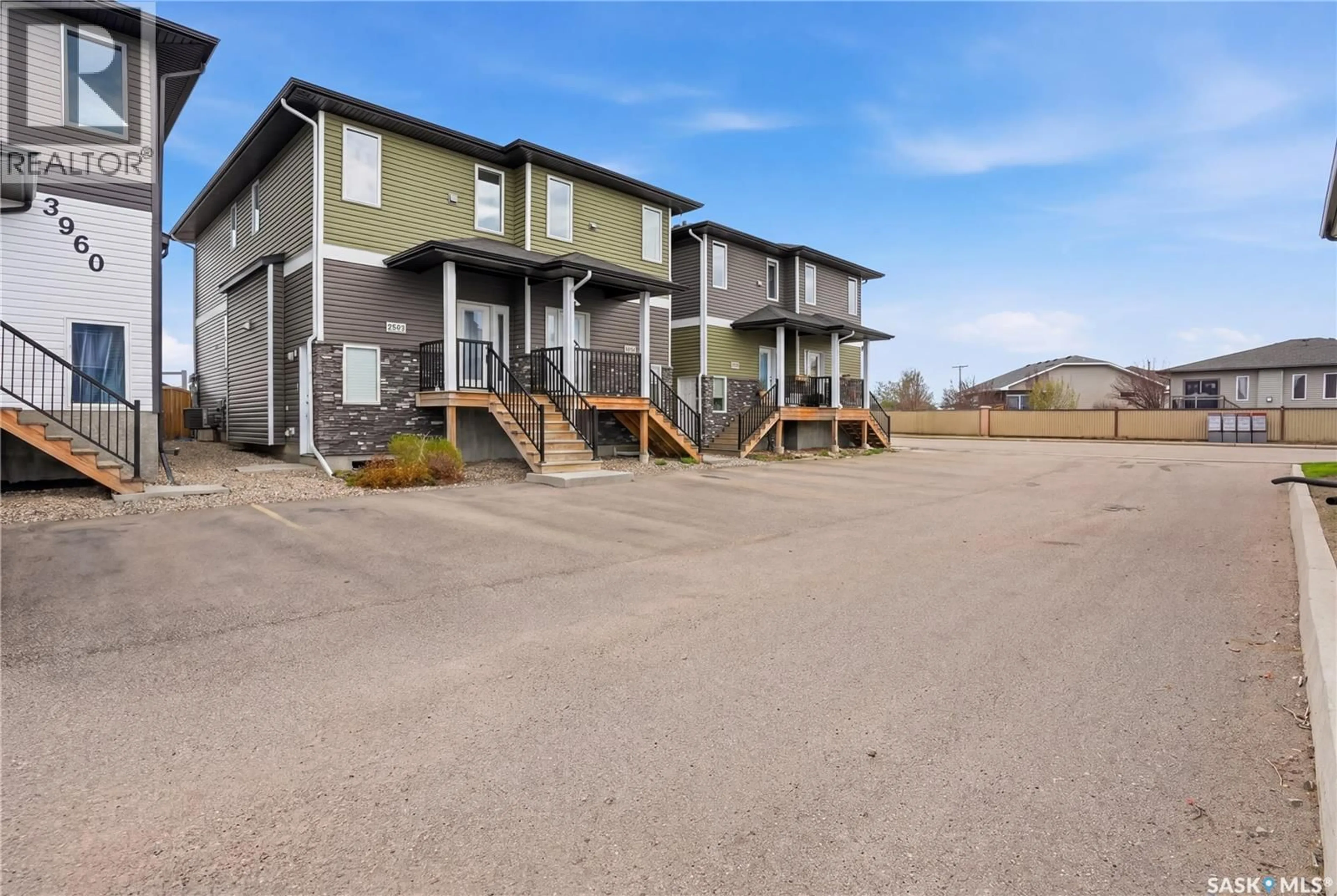 A pic from outside/outdoor area/front of a property/back of a property/a pic from drone, unknown for 4 - 3960 7TH AVENUE, Regina Saskatchewan S4N7L9