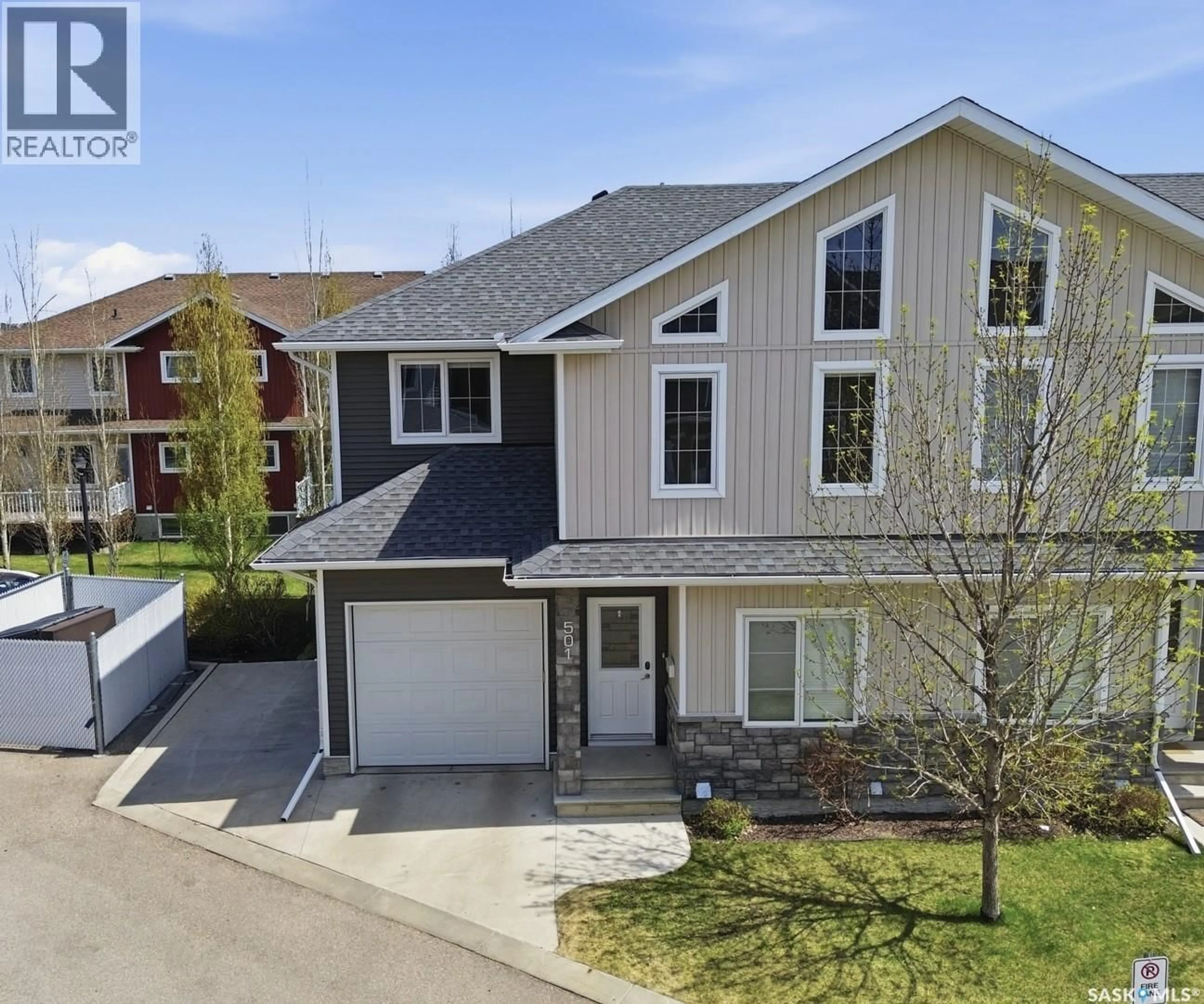 A pic from outside/outdoor area/front of a property/back of a property/a pic from drone, street for 501 315 ZARY ROAD, Saskatoon Saskatchewan S7W0N9