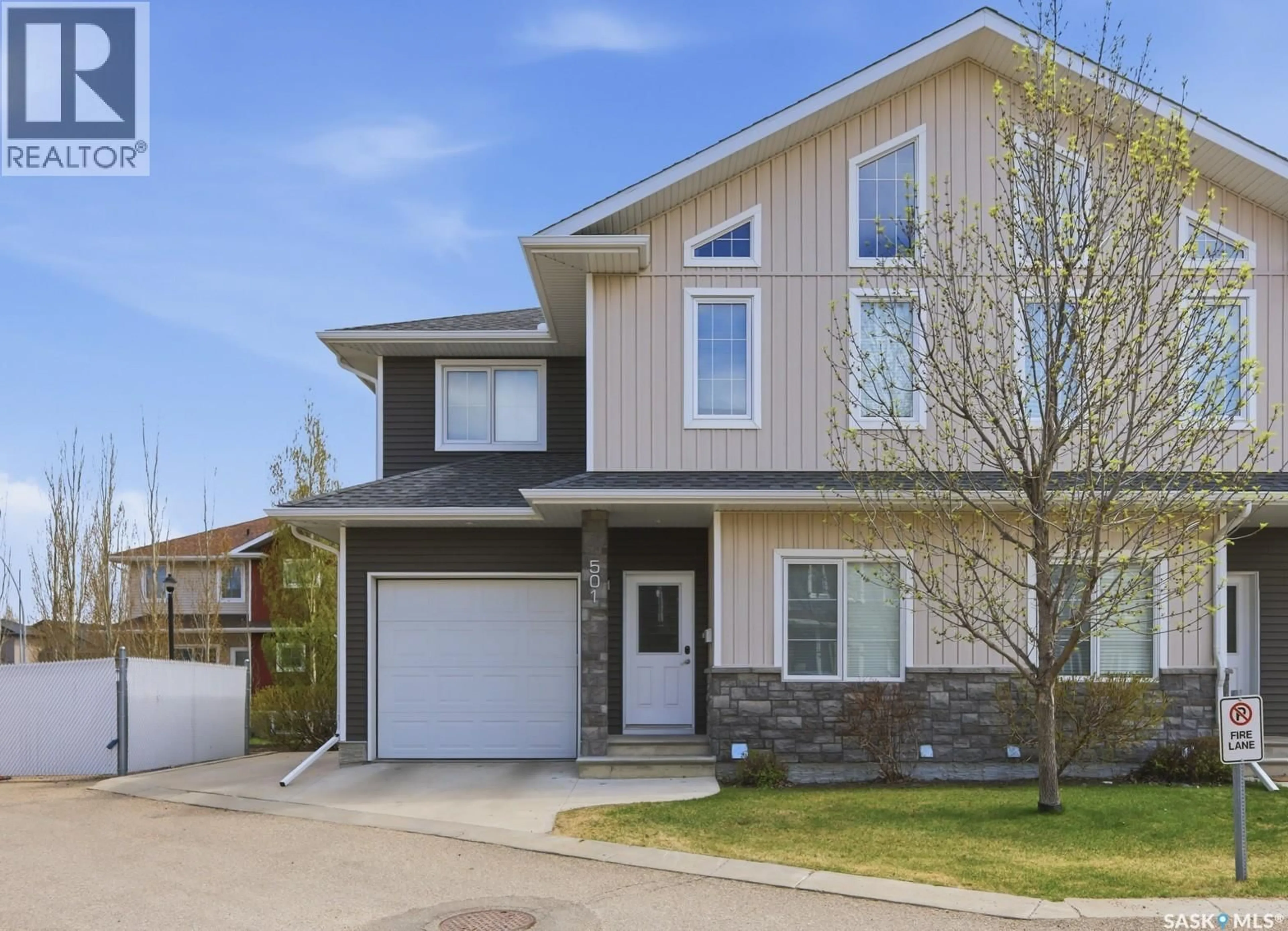 Home with vinyl exterior material, street for 501 315 ZARY ROAD, Saskatoon Saskatchewan S7W0N9