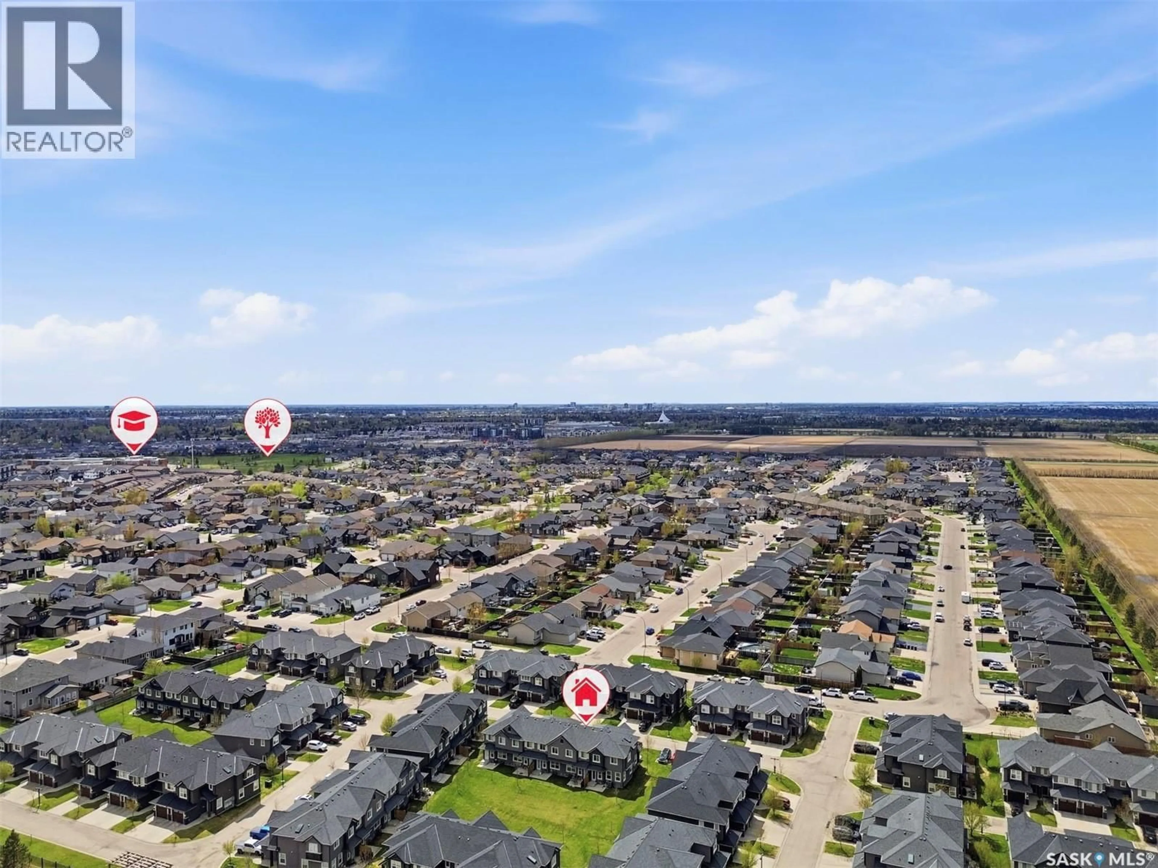 A pic from outside/outdoor area/front of a property/back of a property/a pic from drone, unknown for 427 1303 PATON CRESCENT, Saskatoon Saskatchewan S7V0P6