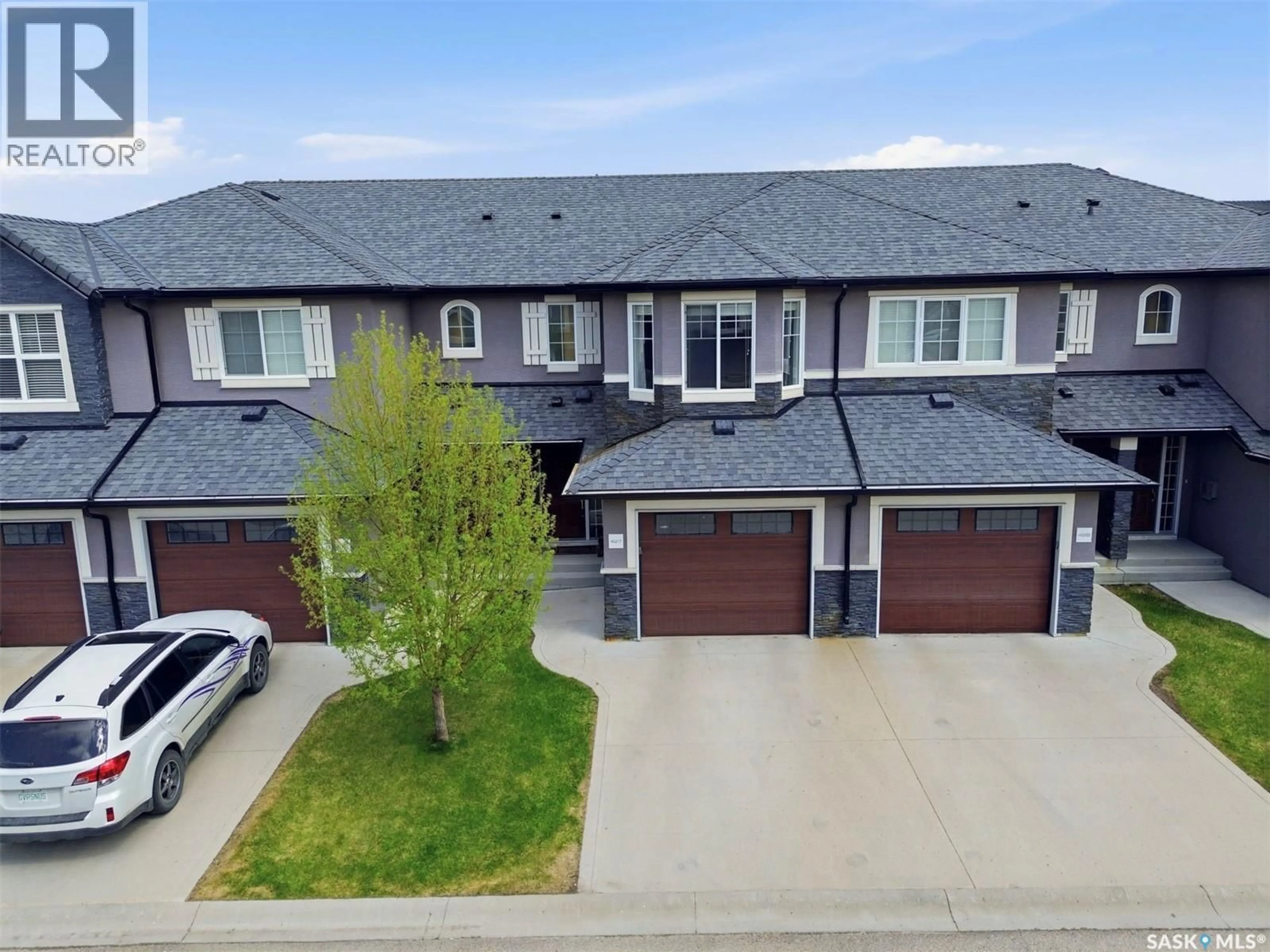A pic from outside/outdoor area/front of a property/back of a property/a pic from drone, street for 427 1303 PATON CRESCENT, Saskatoon Saskatchewan S7V0P6