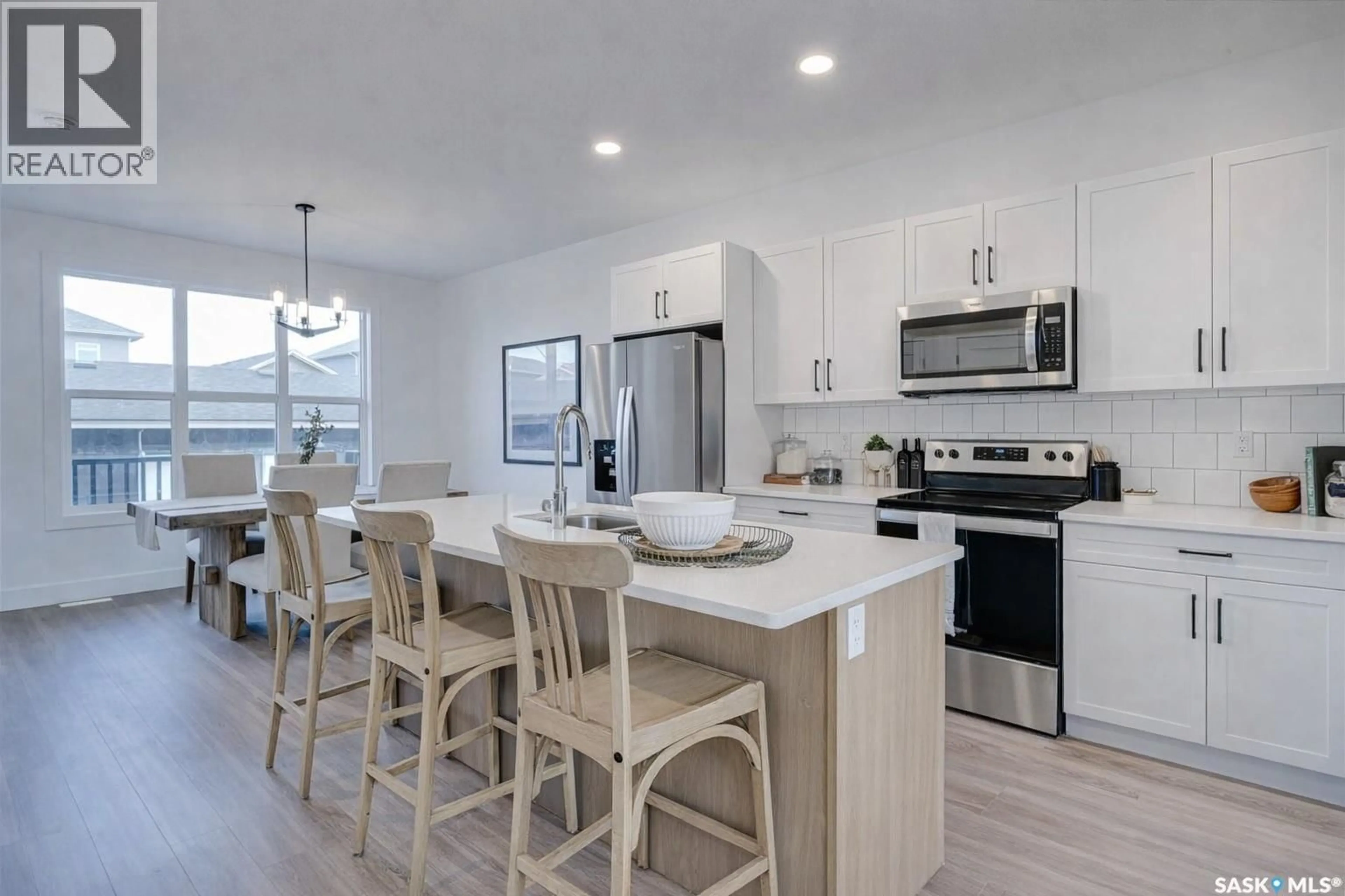Open concept kitchen, ceramic/tile floor for 145 ROSEWOOD BOULEVARD, Saskatoon Saskatchewan S7V0P4