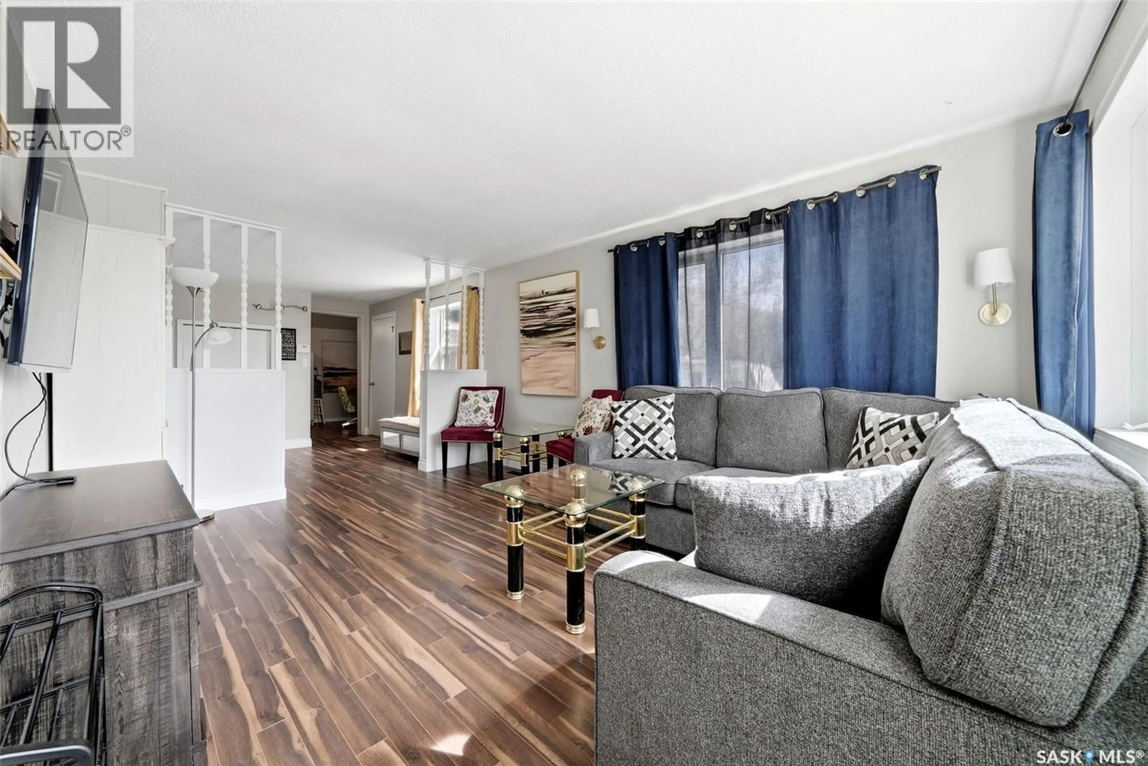 Living room with furniture, wood/laminate floor for 533 FORT SAN ROAD, Fort San Saskatchewan S0G1S0