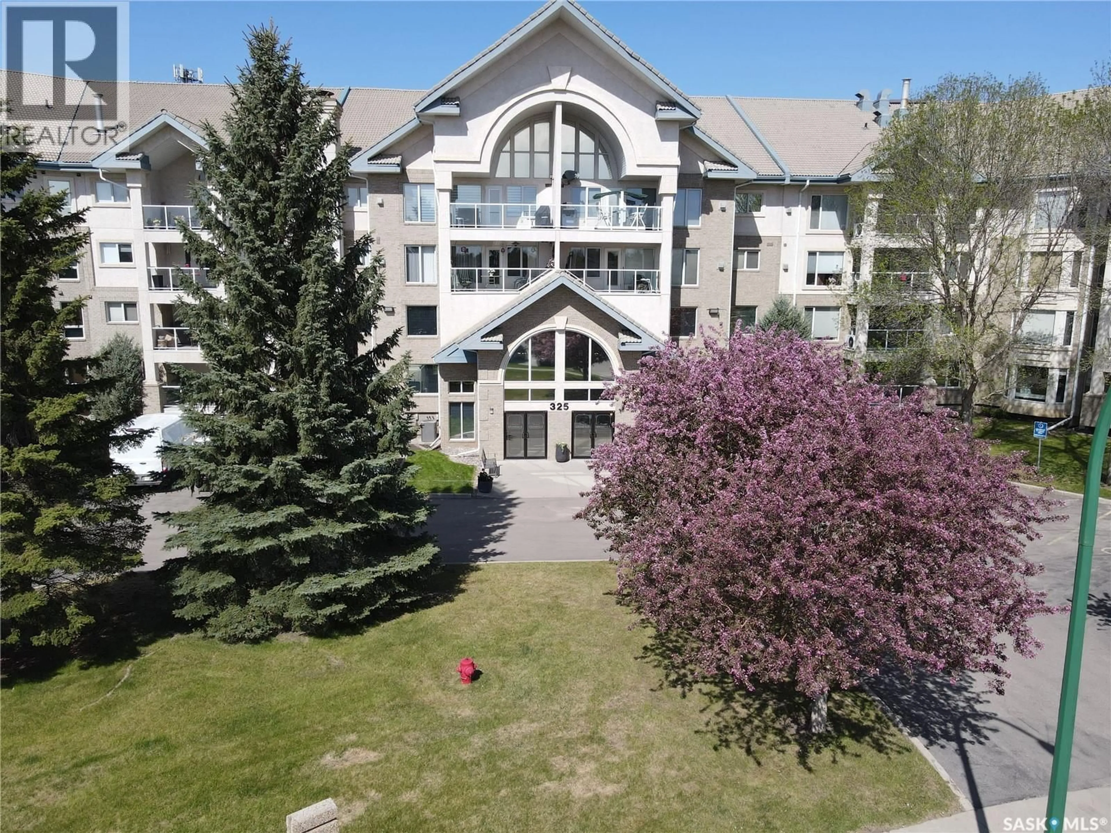 A pic from outside/outdoor area/front of a property/back of a property/a pic from drone, mountain view for 432 325 KEEVIL CRESCENT, Saskatoon Saskatchewan S7N4R8