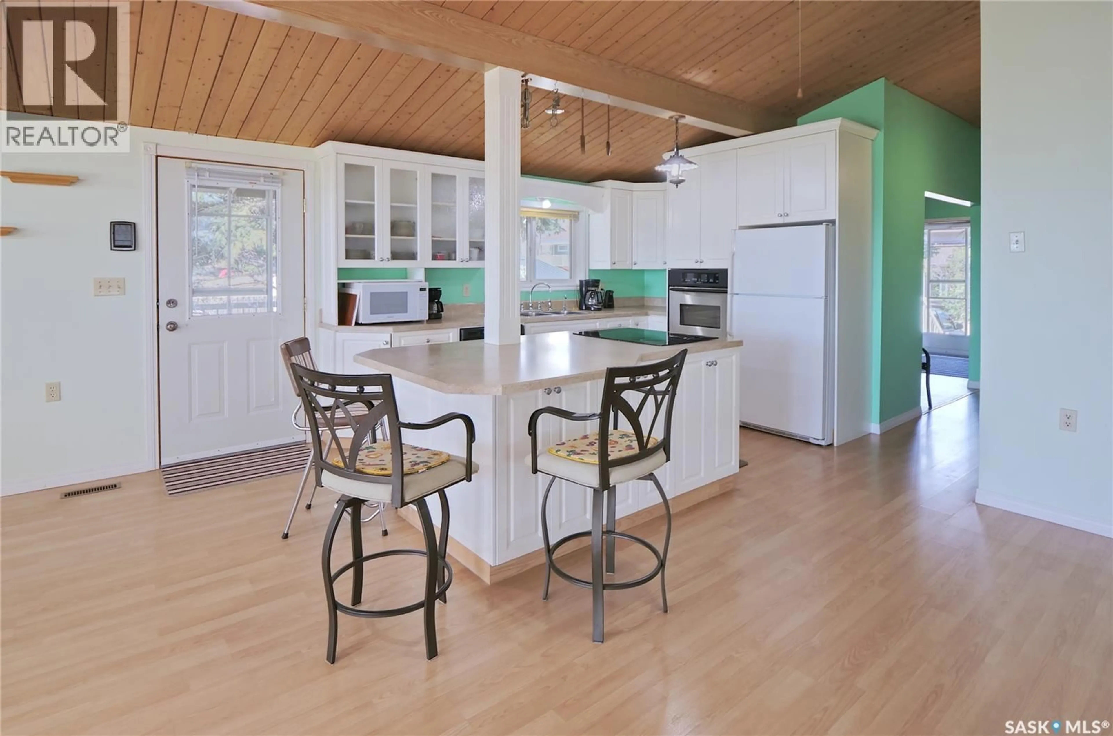 Open concept kitchen, wood/laminate floor for 20 MAINPRIZE BAY, Maple Bush Rm No. 224 Saskatchewan S0H3P0