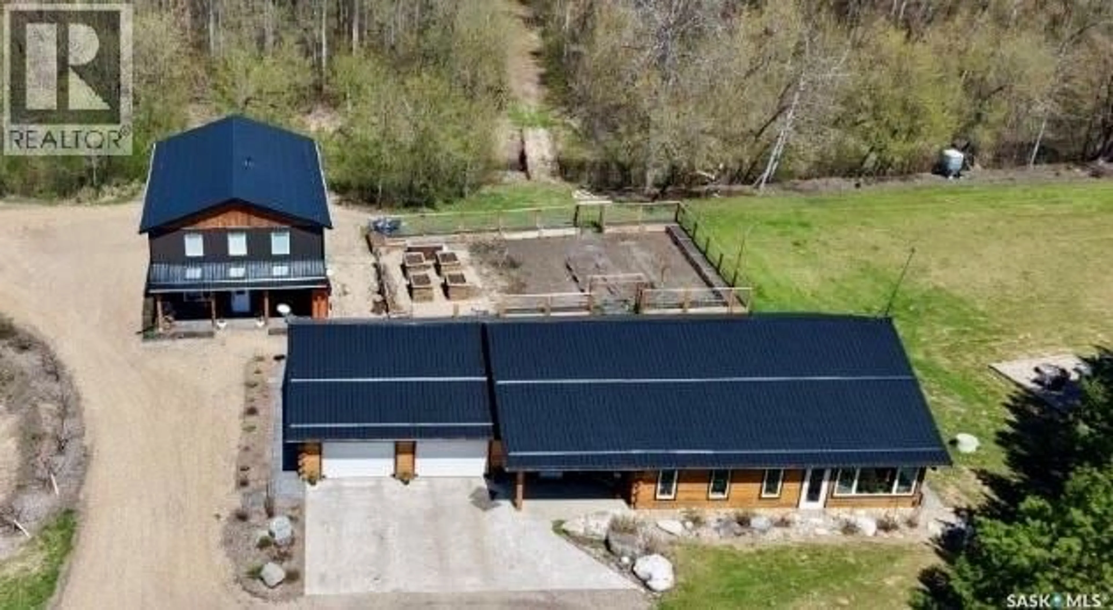 A pic from outside/outdoor area/front of a property/back of a property/a pic from drone, building for 2 bedroom suite - Acreage HOME W/DETACHED IN LAW, Hudson Bay Rm No. 394 Saskatchewan S0E0Y0