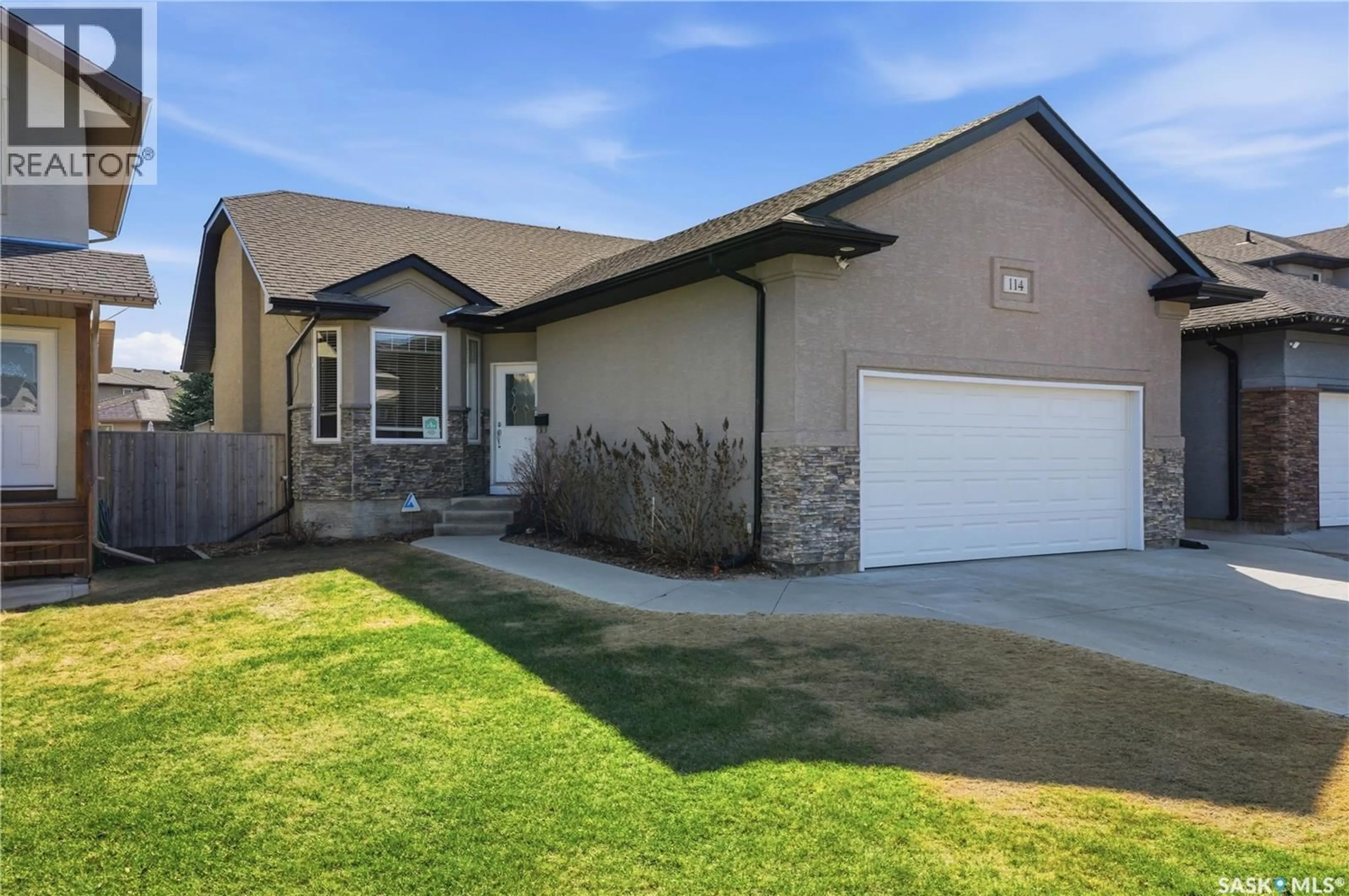 Home with vinyl exterior material, street for 114 FAWCETT CRESCENT, Saskatoon Saskatchewan S7T0G1