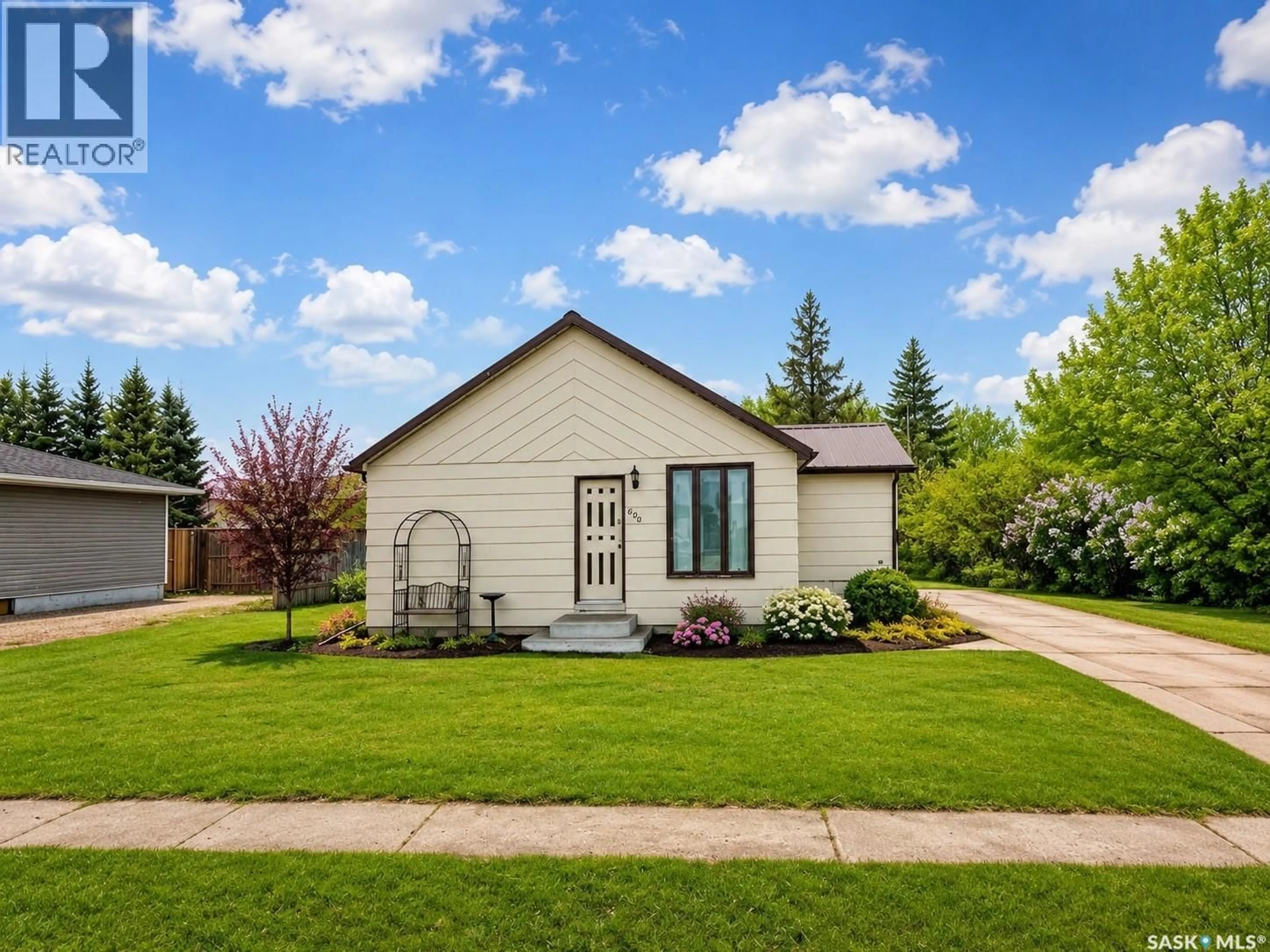 Home with vinyl exterior material, street for 620 2ND AVENUE, Raymore Saskatchewan S0A3J0