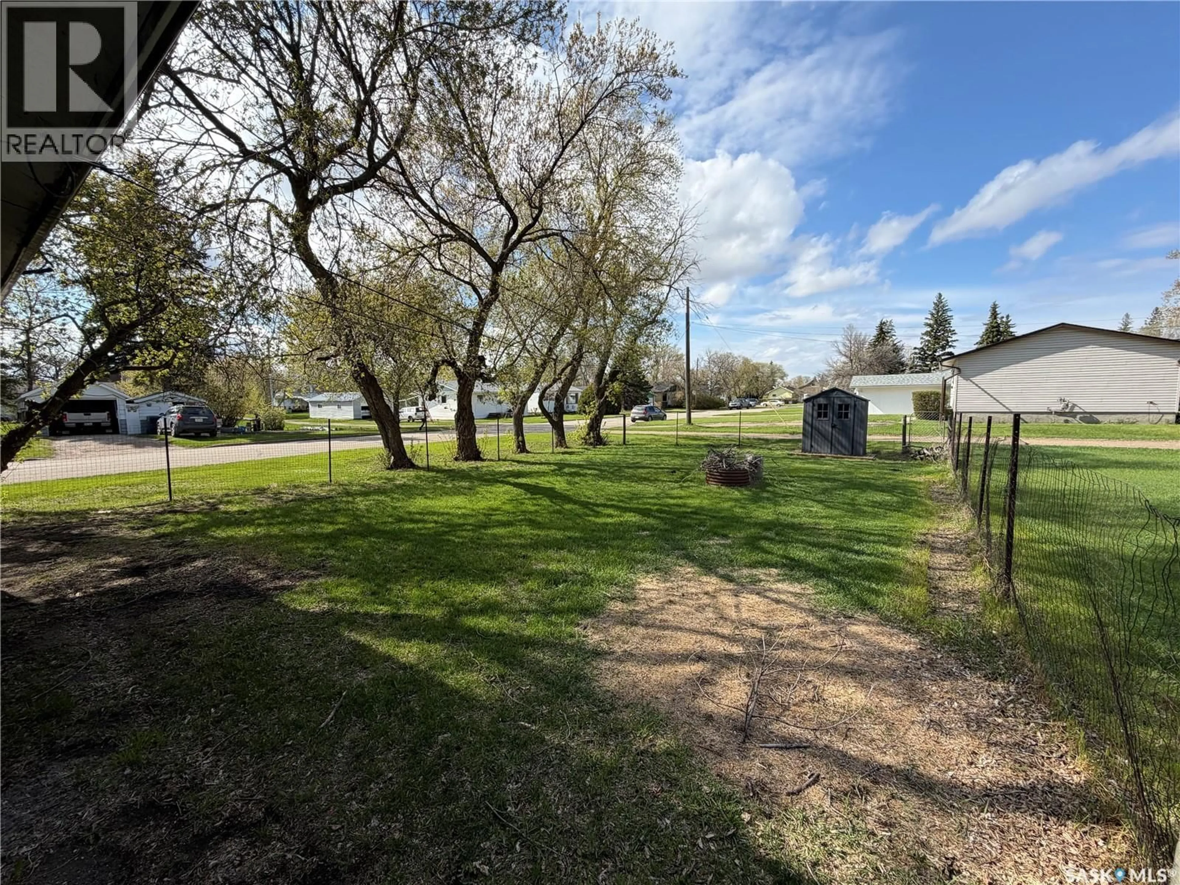 A pic from outside/outdoor area/front of a property/back of a property/a pic from drone, forest/trees view for 10 RAILWAY AVENUE, Redvers Saskatchewan S0C2H0