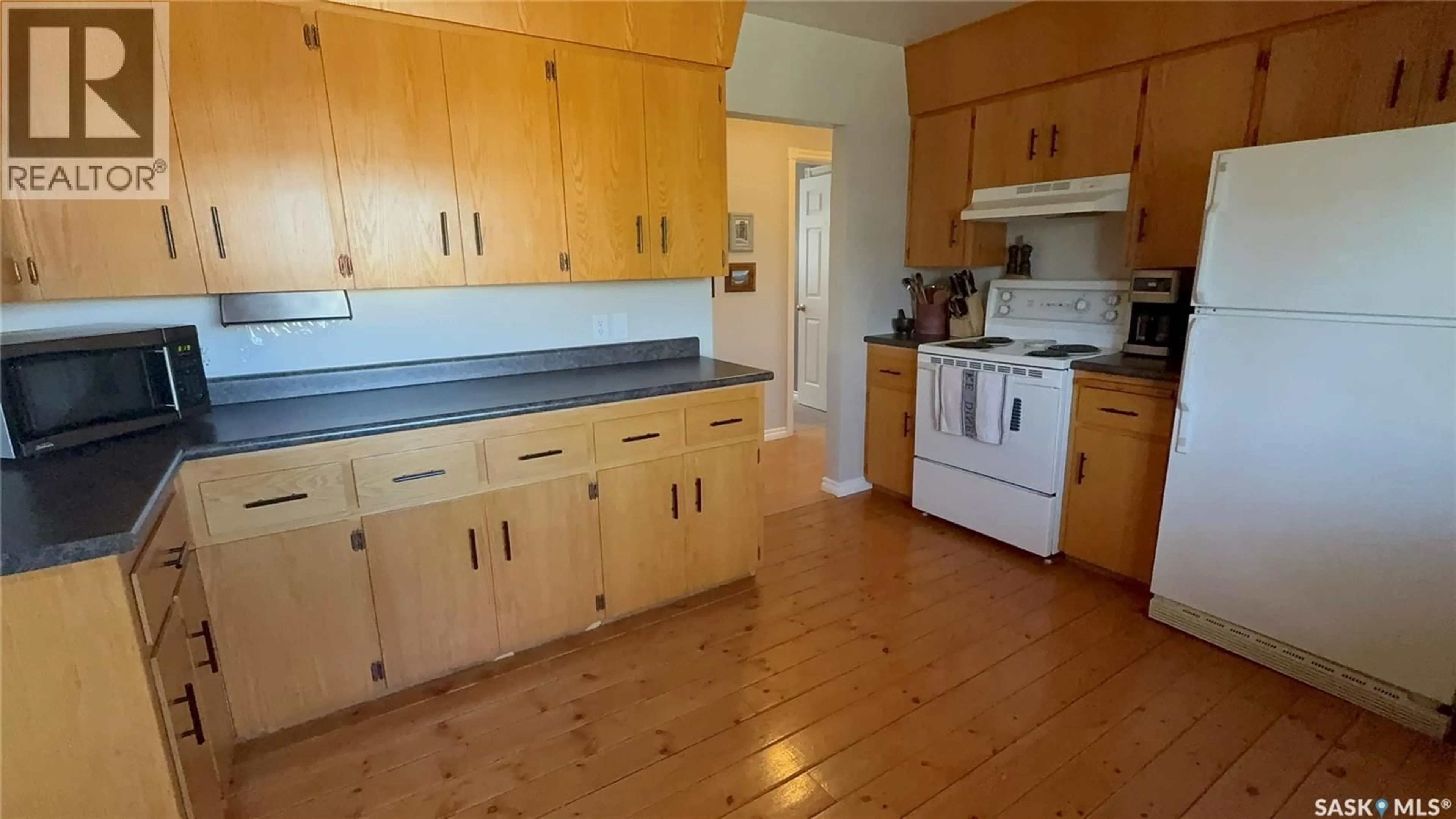 Standard kitchen, wood/laminate floor for 1009 FIRST STREET, Estevan Saskatchewan S4A0G7