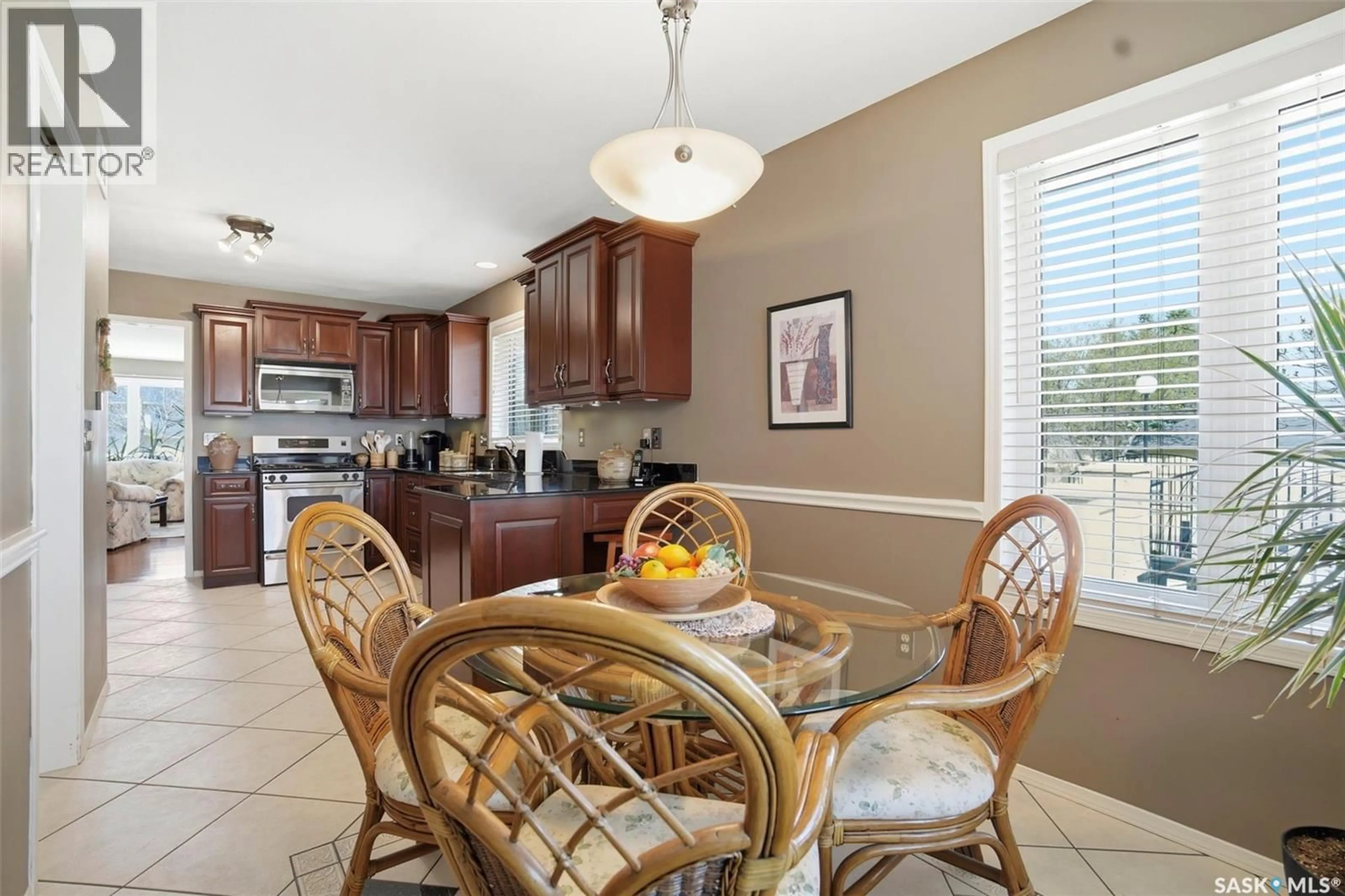 Open concept kitchen, ceramic/tile floor for 1 330 STODOLA COURT, Saskatoon Saskatchewan S7N1N9