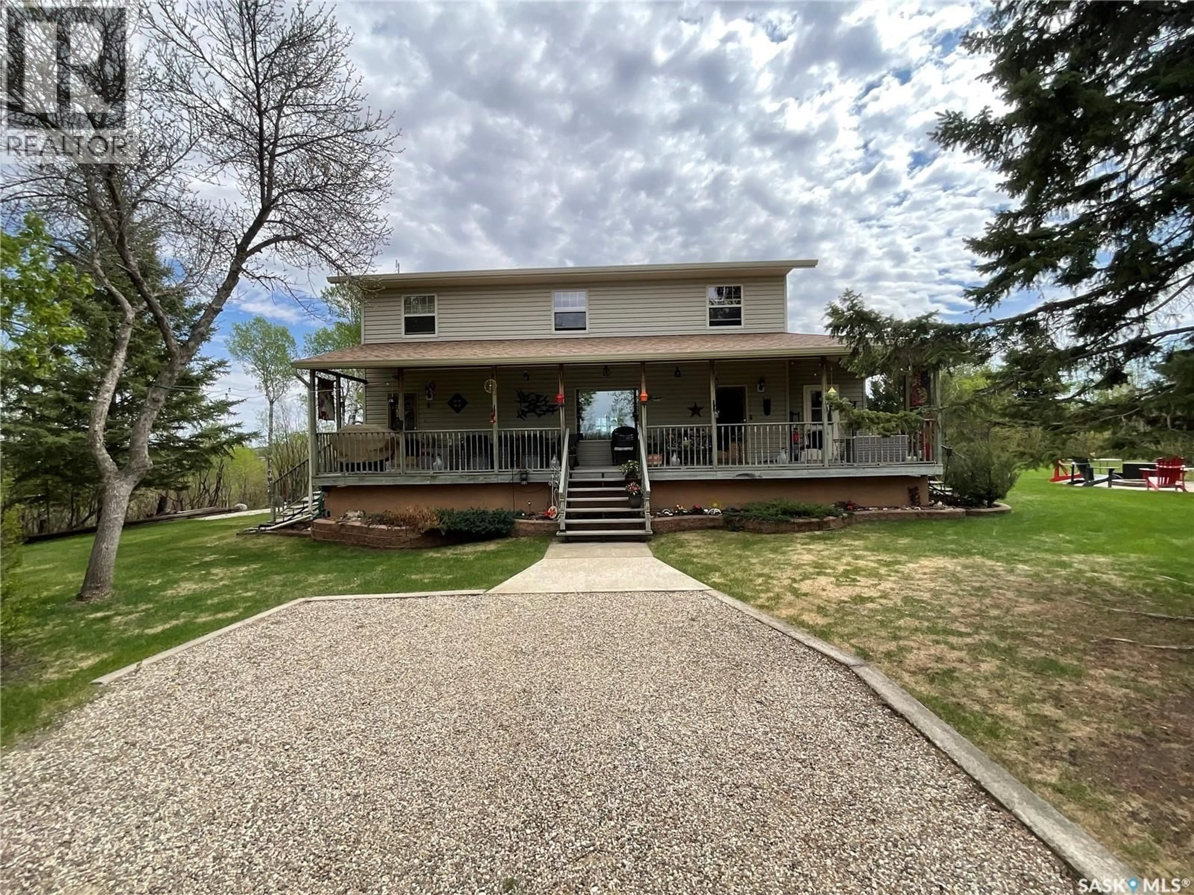 A pic from outside/outdoor area/front of a property/back of a property/a pic from drone, unknown for 5609 SCOTT'S POINT ROAD, Wakaw Saskatchewan S0K4P0