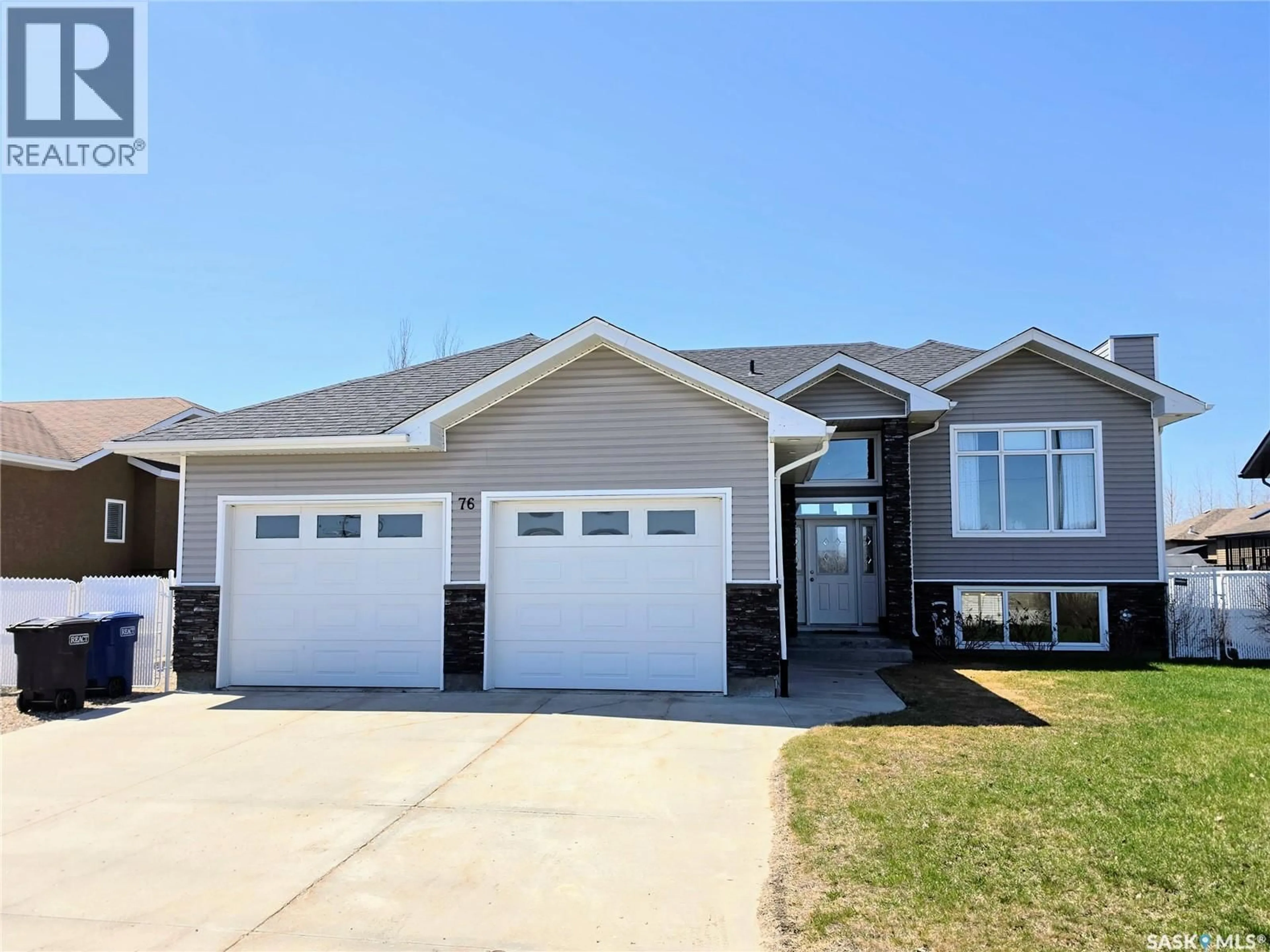 Home with vinyl exterior material, street for 76 101ST STREET, Humboldt Saskatchewan S0K2A0