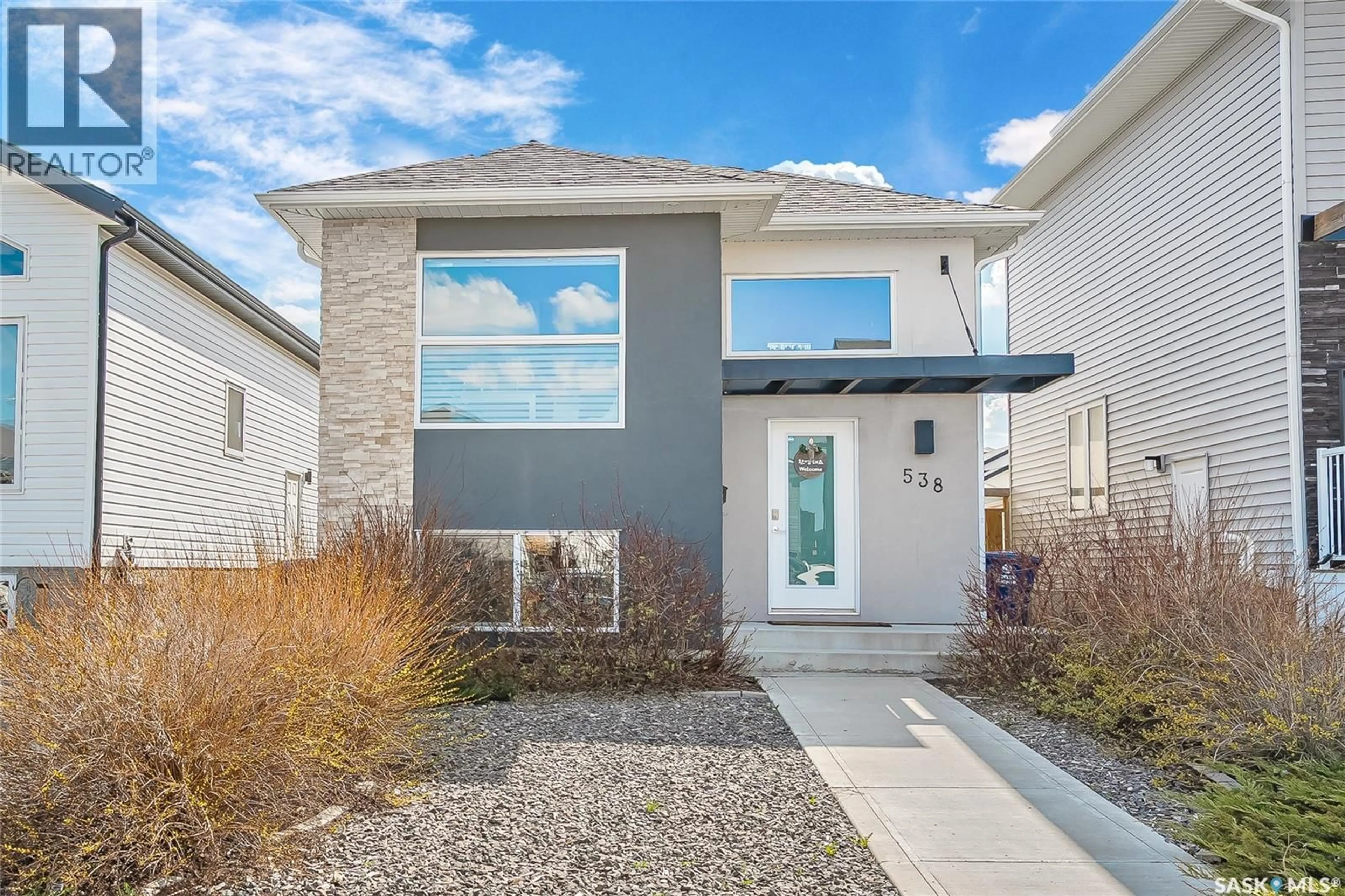 Home with vinyl exterior material, street for 538 FAST WAY, Saskatoon Saskatchewan S7W0W9