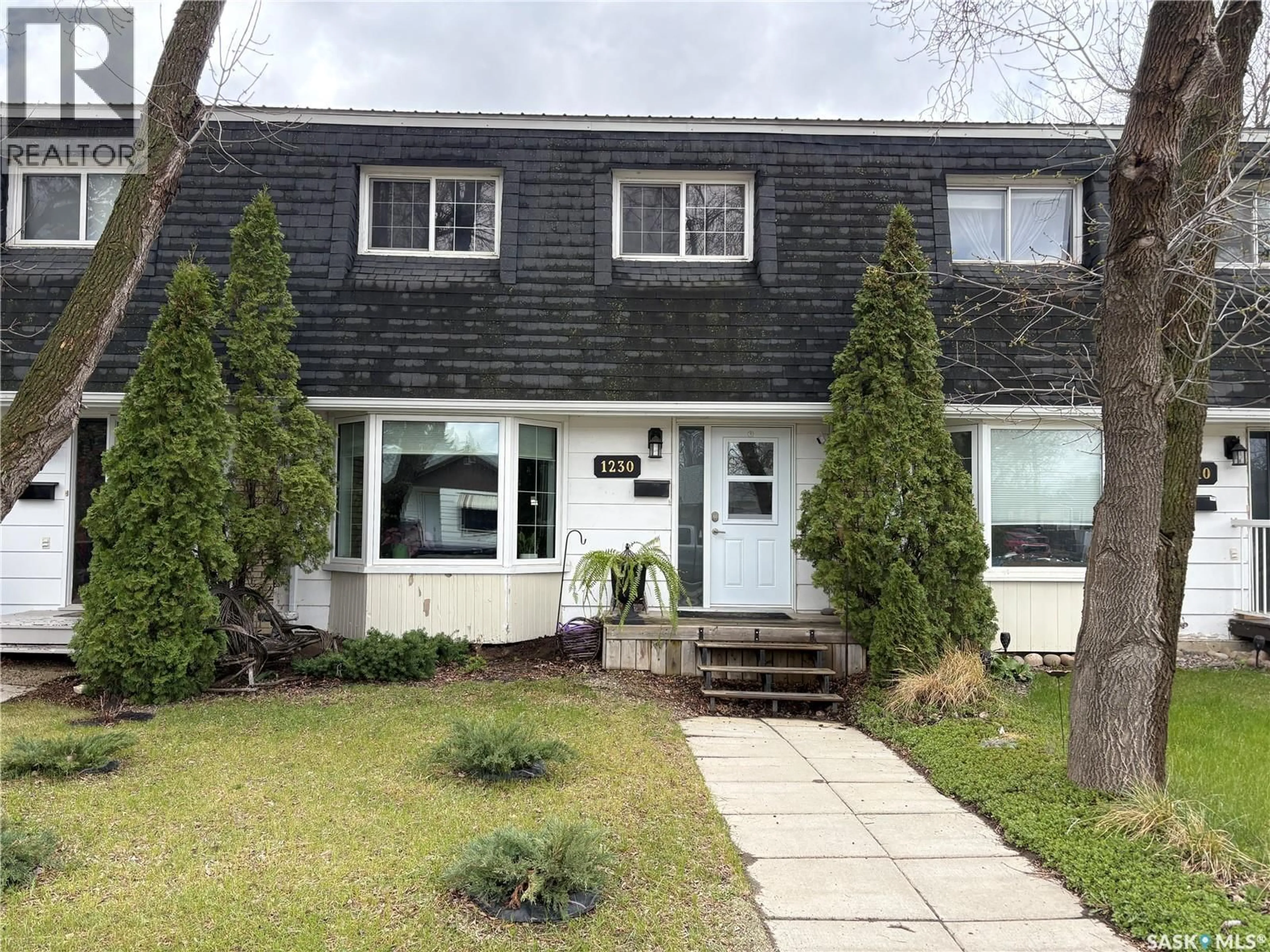 Home with vinyl exterior material, street for 1230 CHAPLIN STREET, Swift Current Saskatchewan S9H1K1