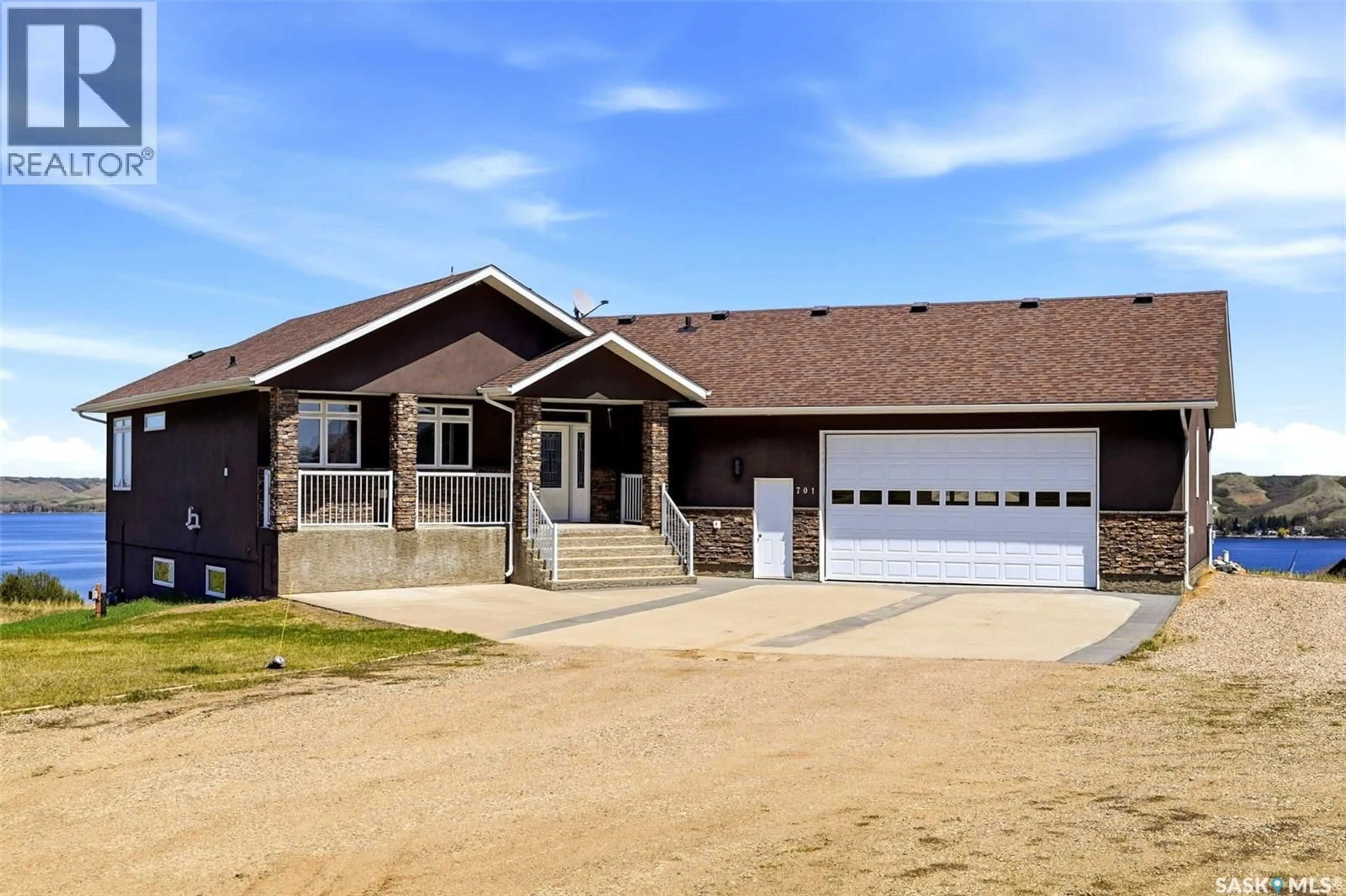 Home with brick exterior material, street for 701 SASKATOON DRIVE, Katepwa Beach Saskatchewan S0G2Y0