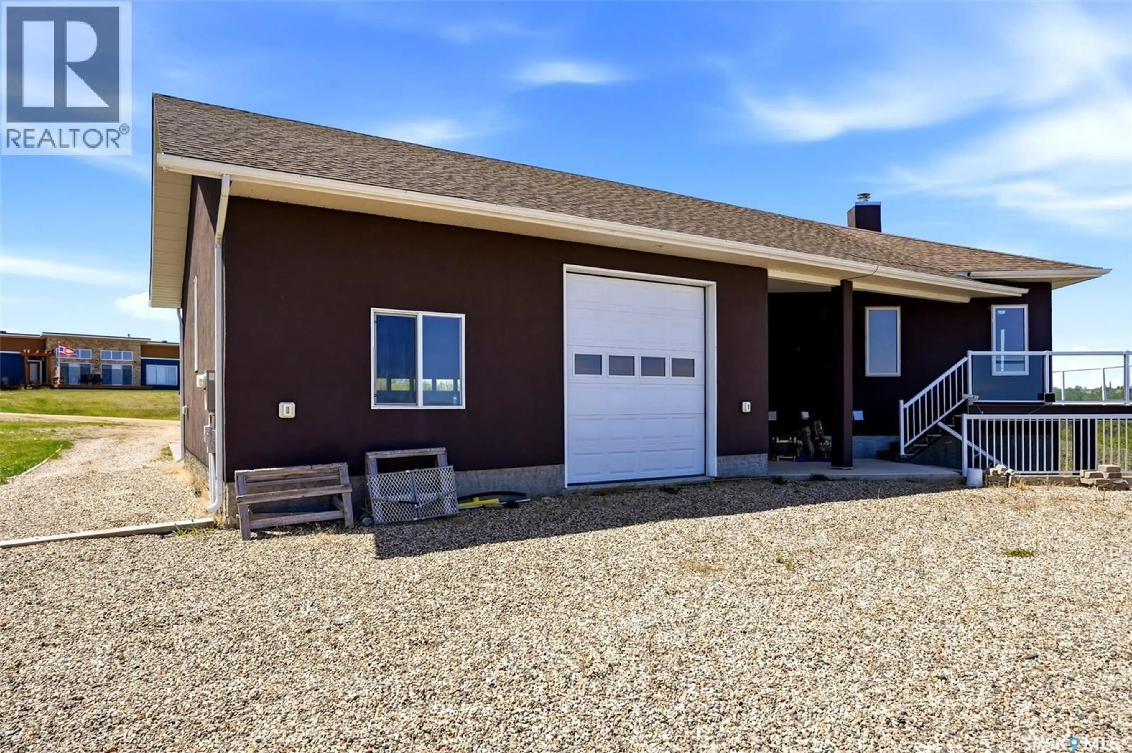 Home with vinyl exterior material, street for 701 SASKATOON DRIVE, Katepwa Beach Saskatchewan S0G2Y0