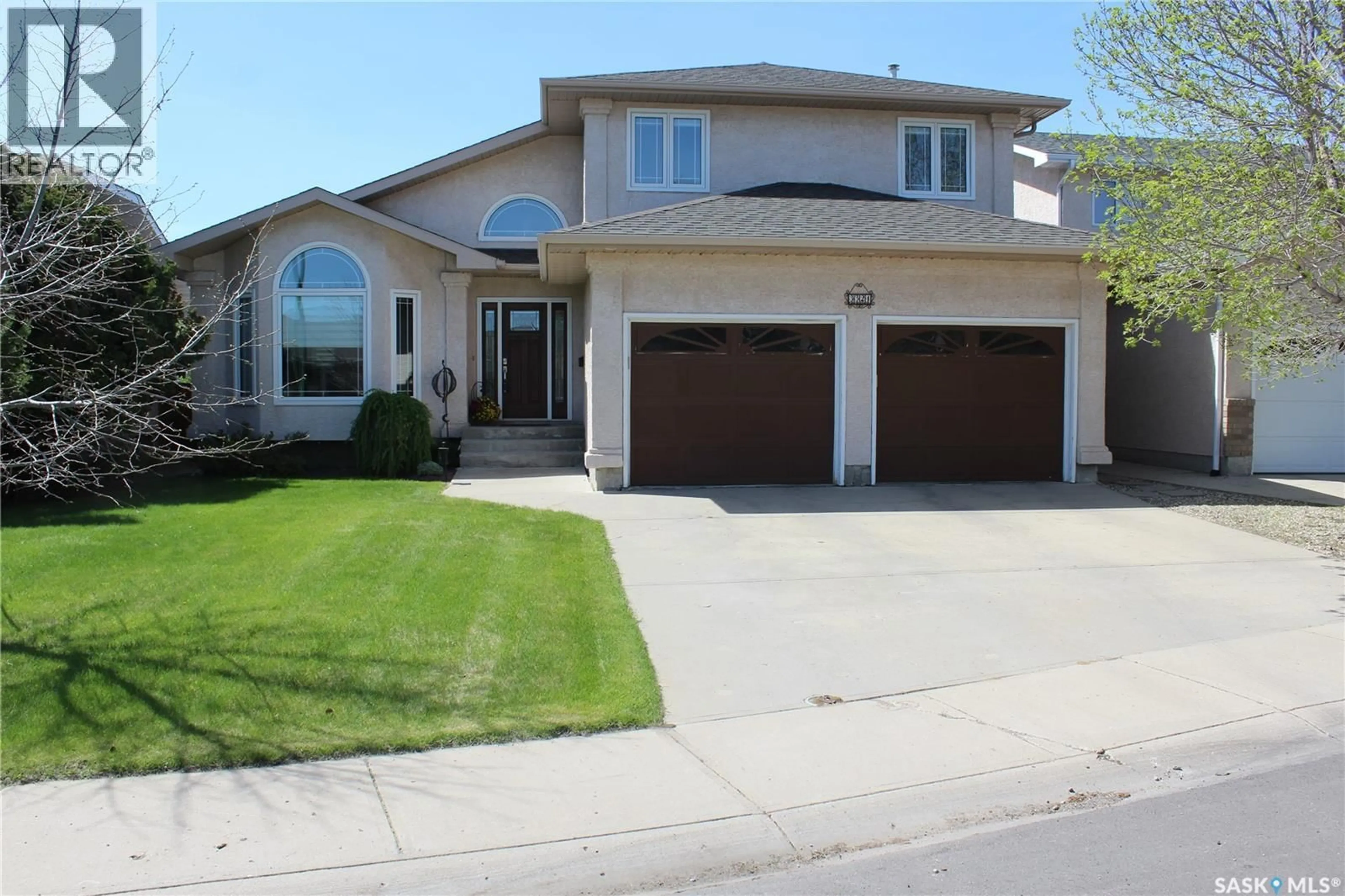 Home with vinyl exterior material, street for 3324 DIETER BAY, Regina Saskatchewan S4V2V9