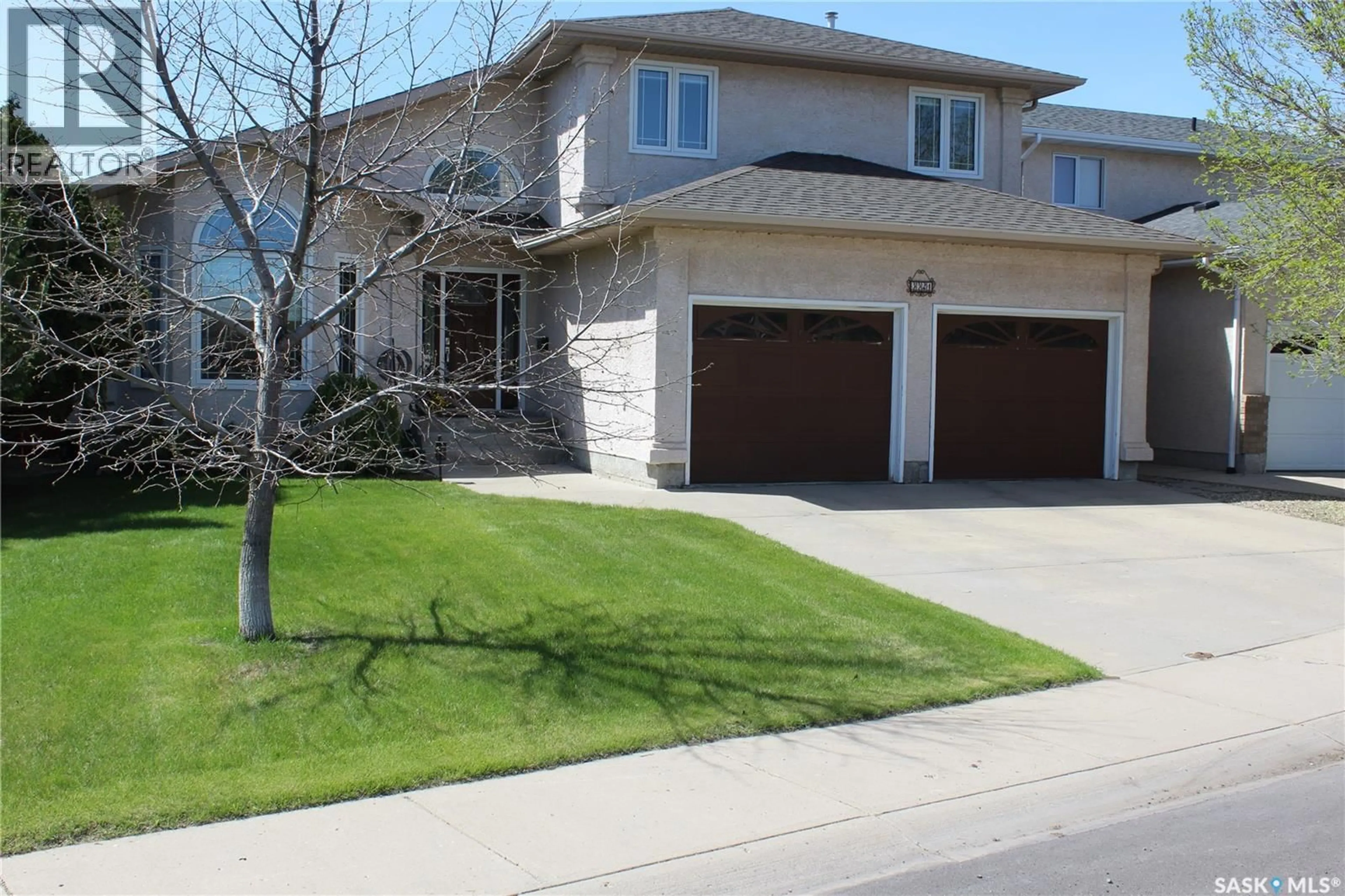 Home with vinyl exterior material, street for 3324 DIETER BAY, Regina Saskatchewan S4V2V9