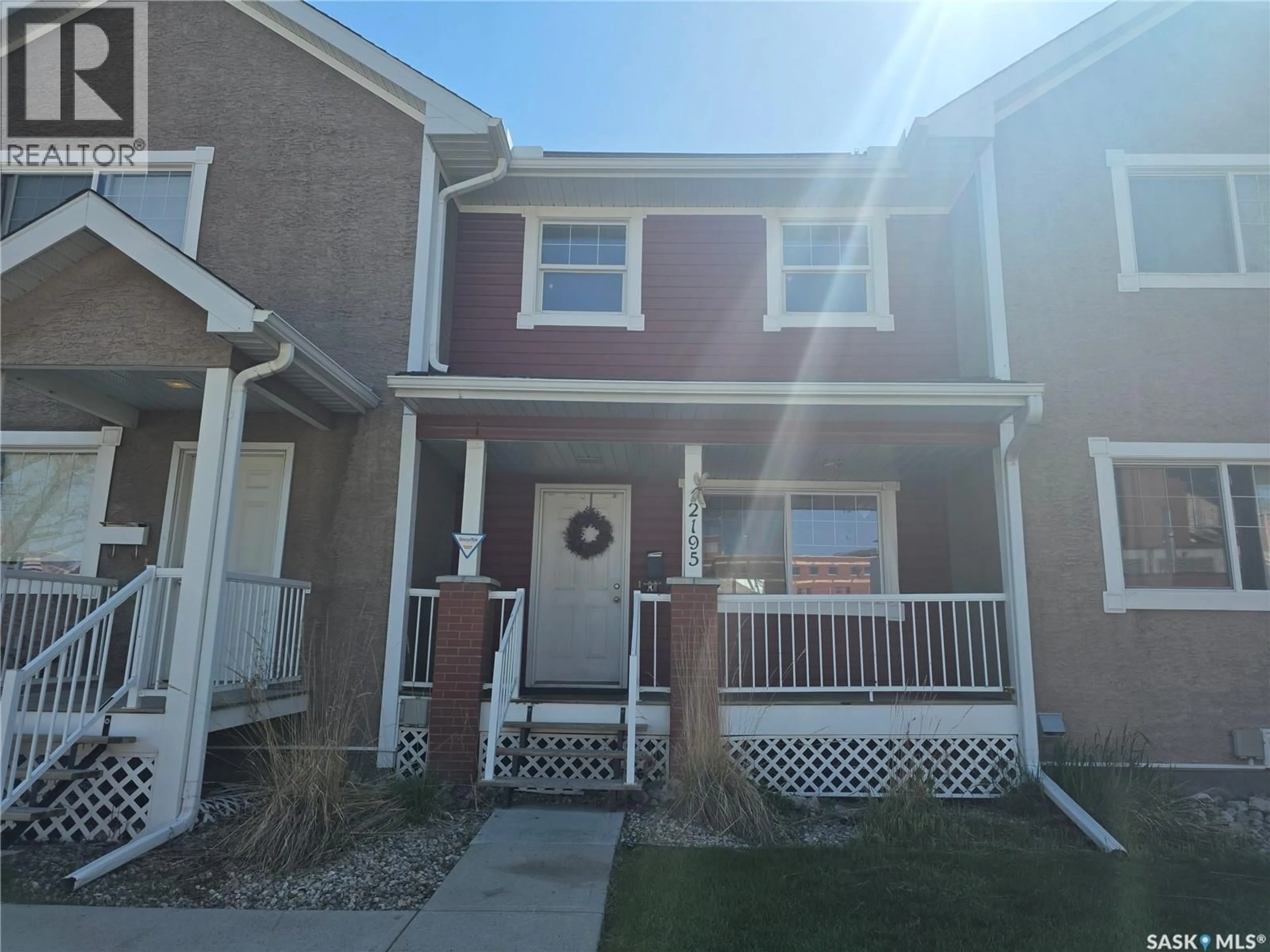 Home with vinyl exterior material, street for 2195 TORONTO STREET, Regina Saskatchewan S4P0B7