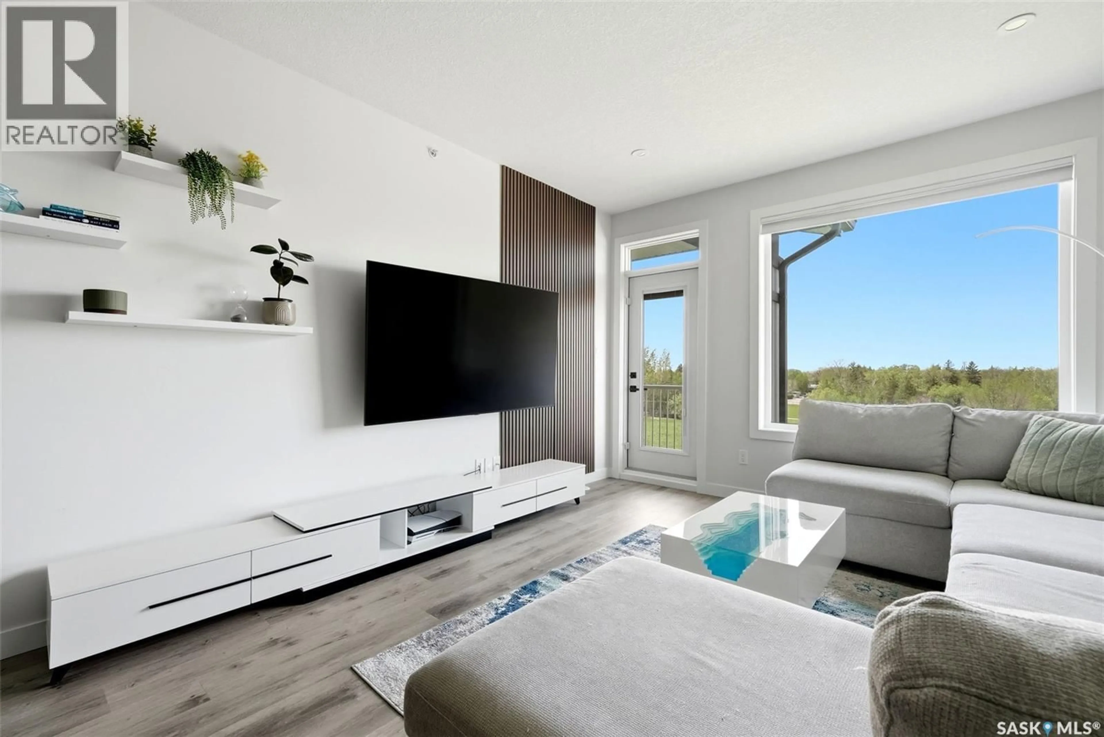 Living room with furniture, unknown for 406 - 3581 EVANS COURT, Regina Saskatchewan S4S0N5