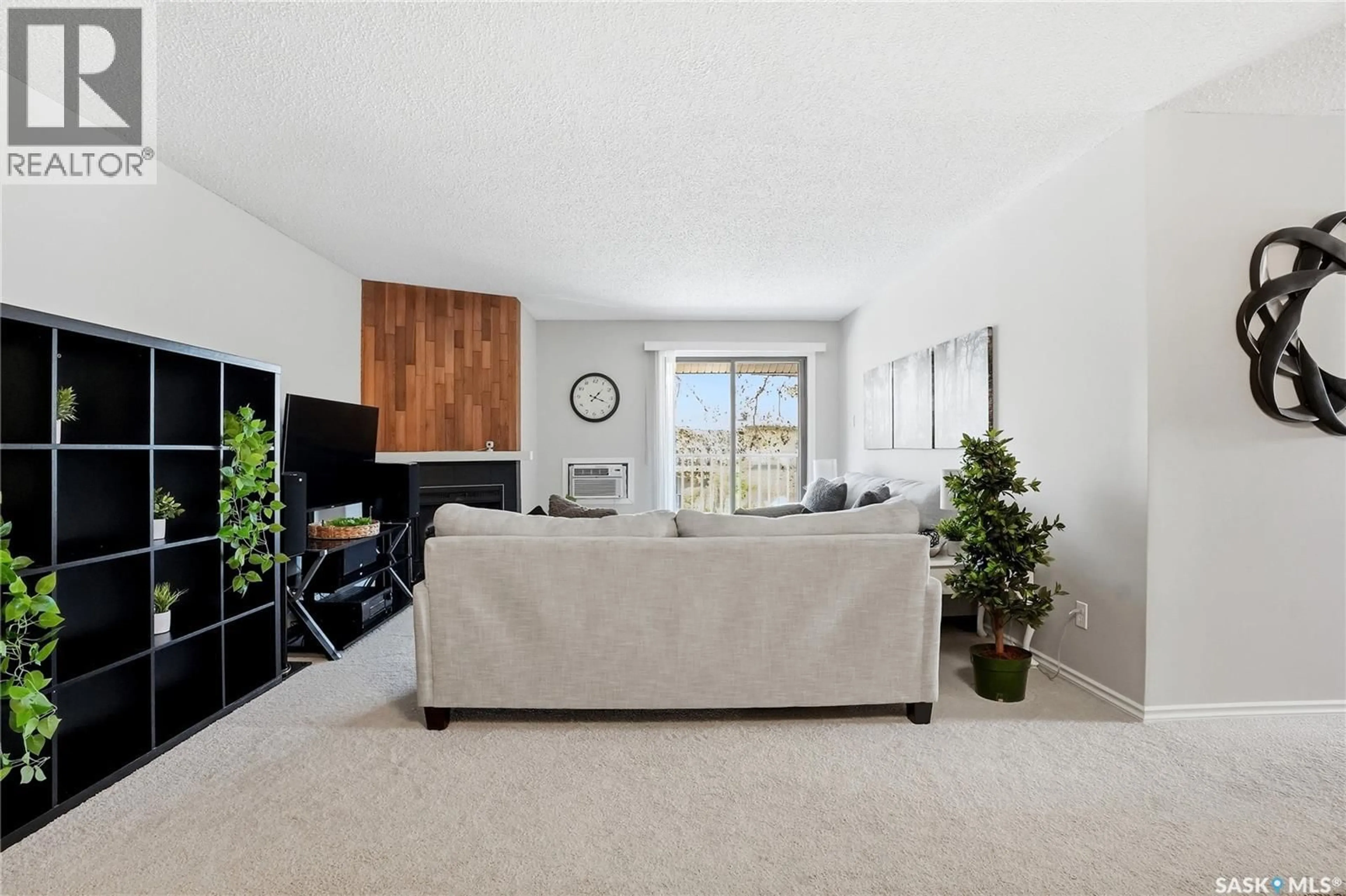 Living room with furniture, unknown for 307G - 1121 MCKERCHER DRIVE, Saskatoon Saskatchewan S7H5B8