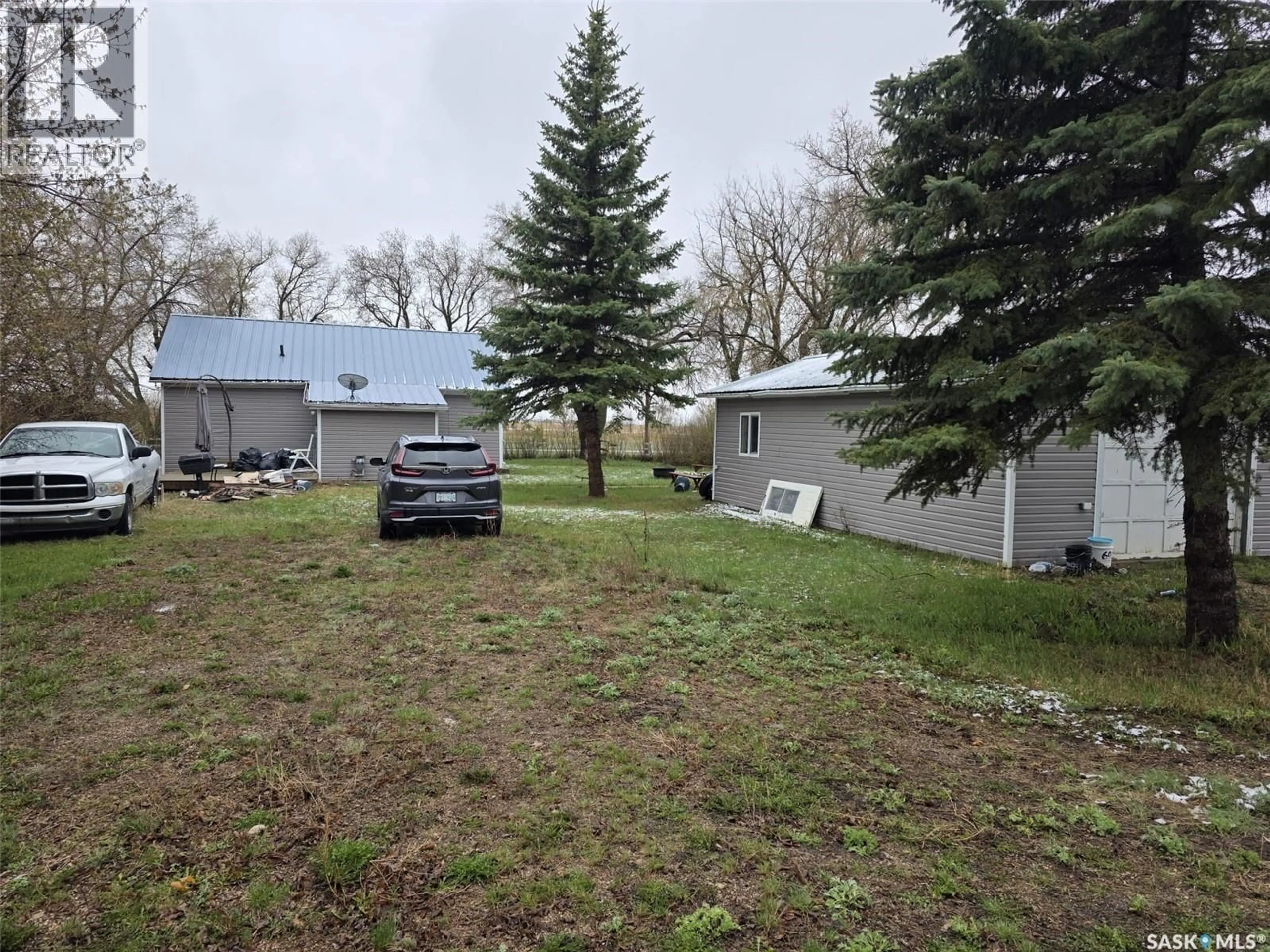 A pic from outside/outdoor area/front of a property/back of a property/a pic from drone, unknown for 700 RAILWAY AVENUE, Dysart Saskatchewan S0G1H0