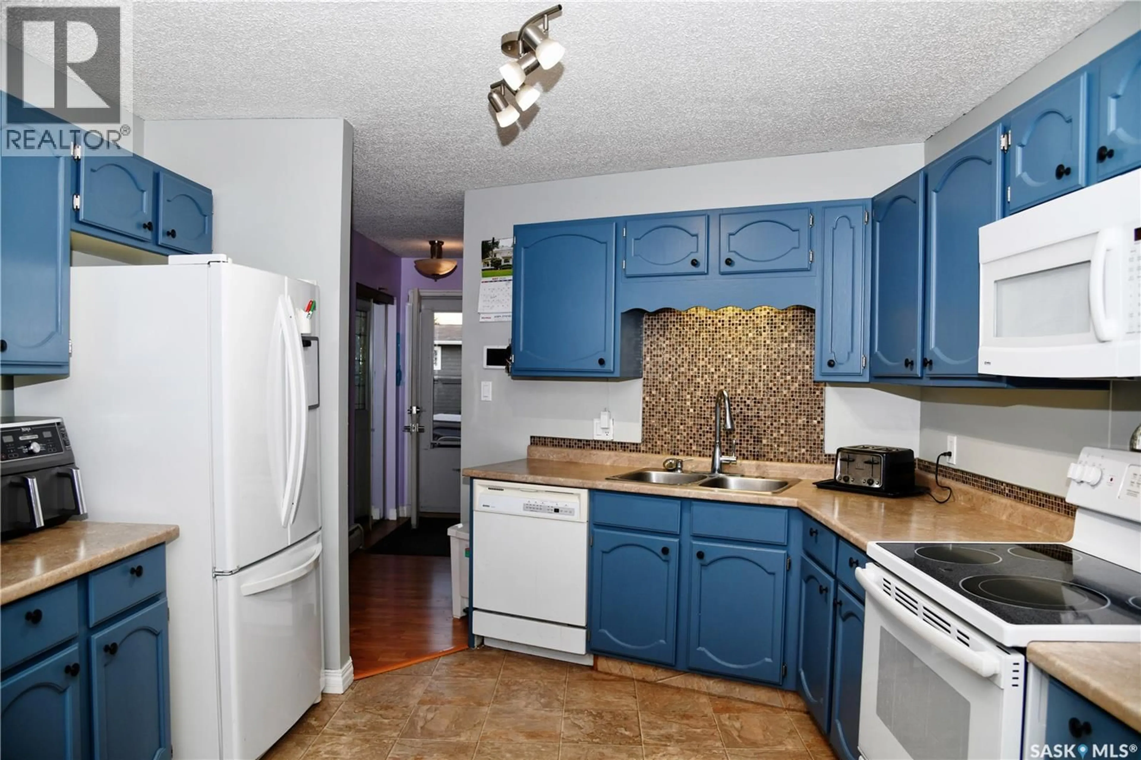 Standard kitchen, ceramic/tile floor for 134 COOPER CRESCENT, Saskatoon Saskatchewan S7M4L3