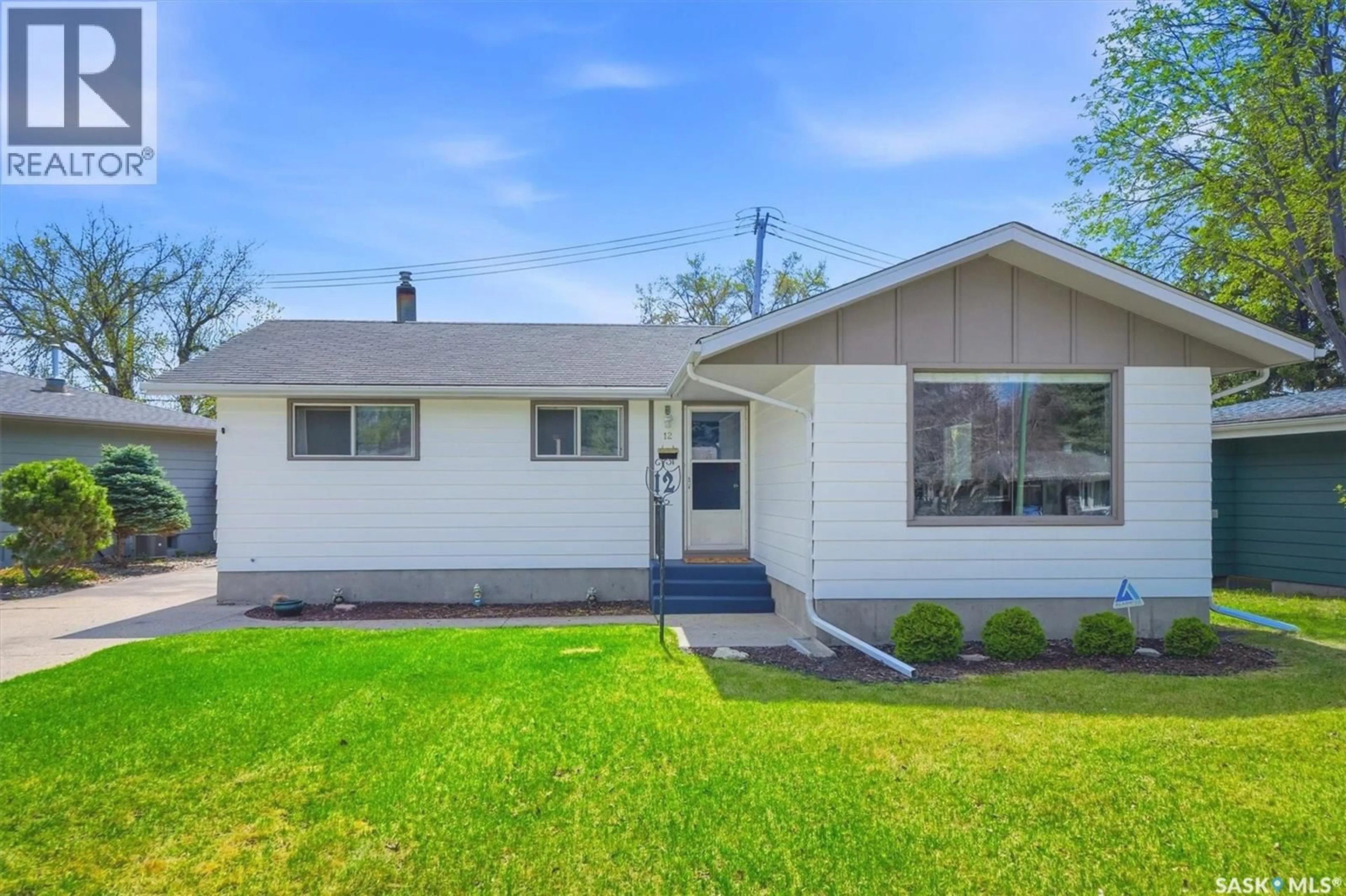 Home with vinyl exterior material, street for 12 MURPHY CRESCENT, Saskatoon Saskatchewan S7J2T4