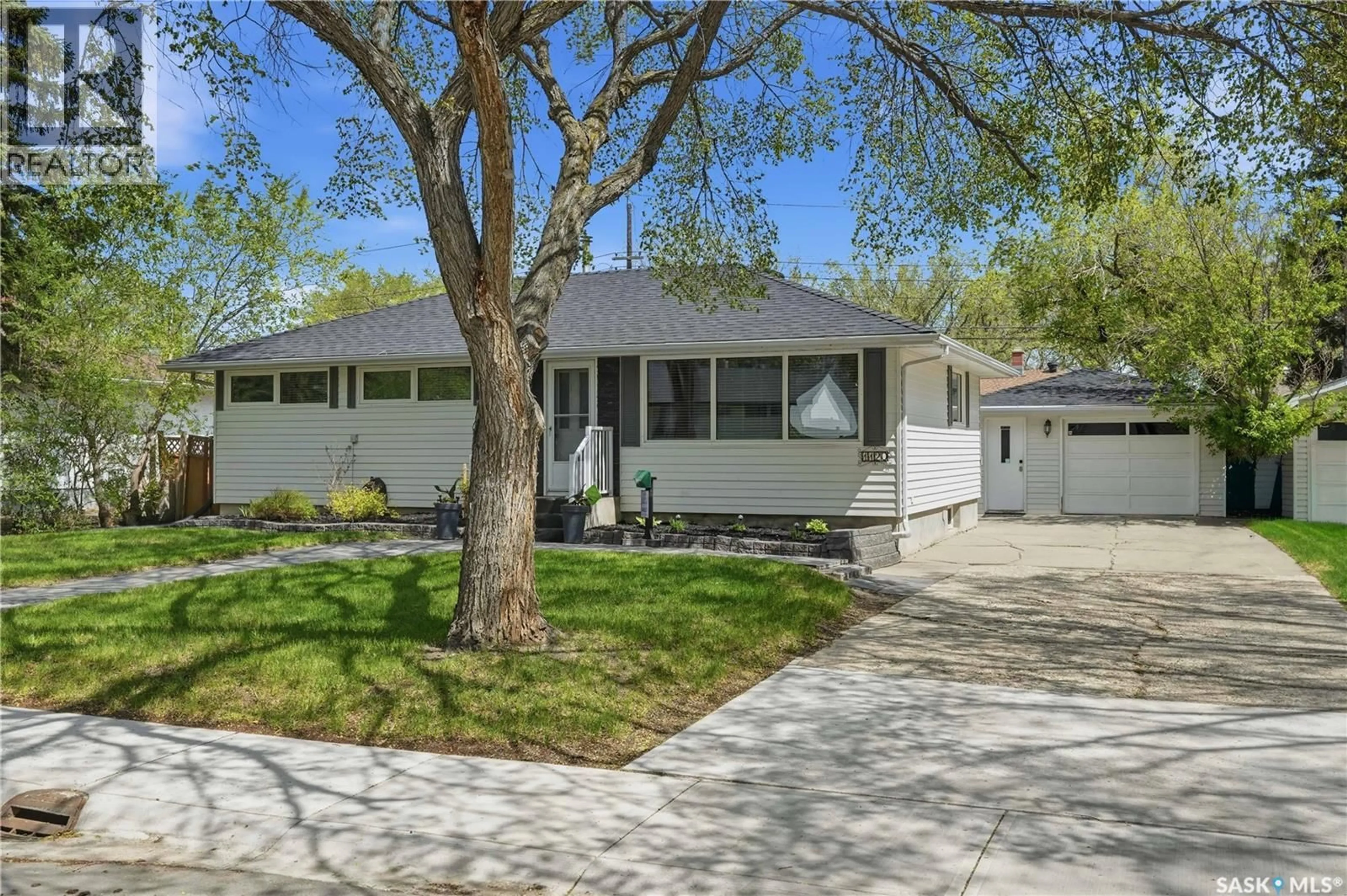 Home with vinyl exterior material, street for 1120 BROADWAY AVENUE, Regina Saskatchewan S4N1A8