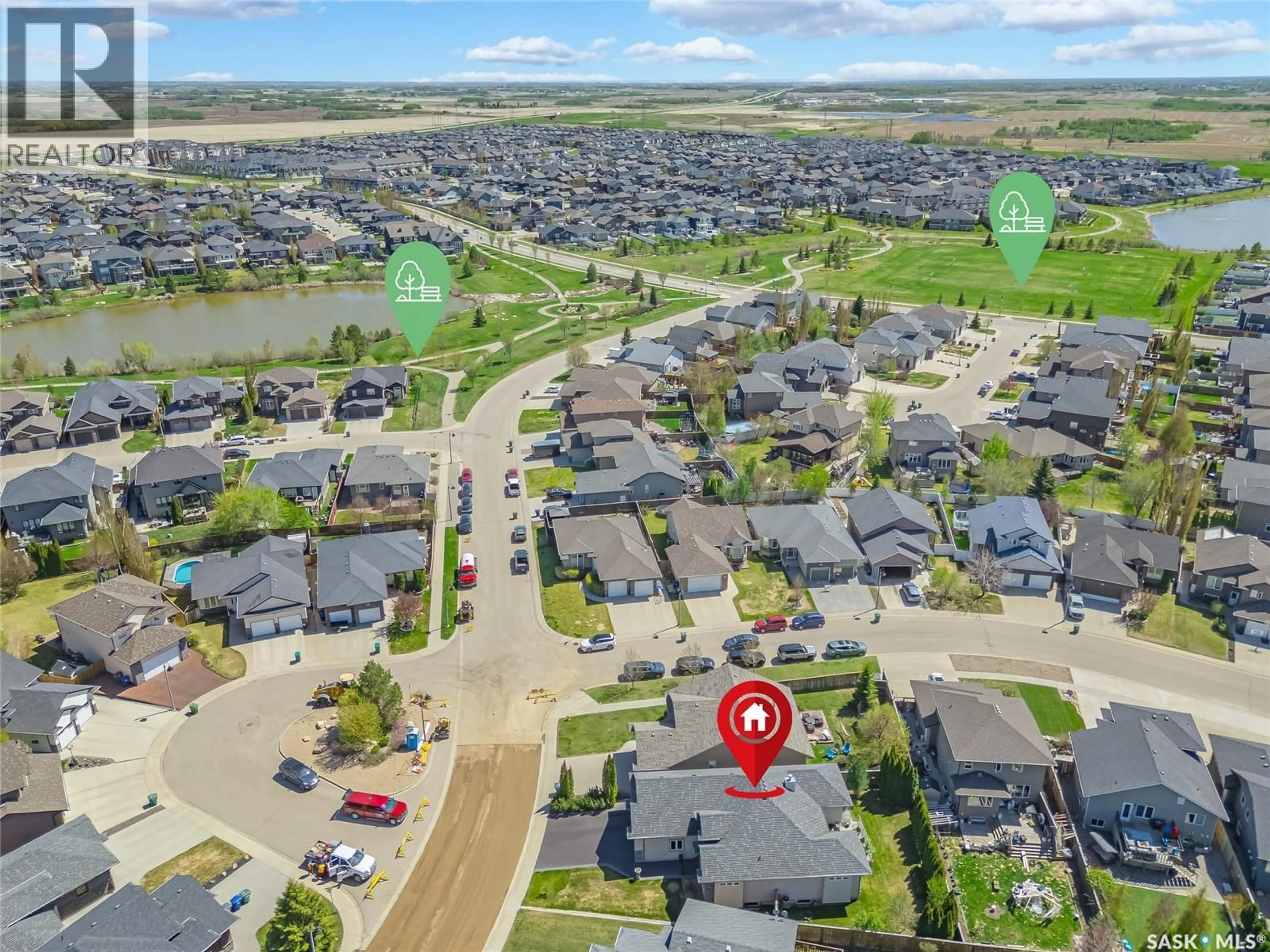 A pic from outside/outdoor area/front of a property/back of a property/a pic from drone, street for 142 ASSALY STREET, Saskatoon Saskatchewan S7T0E4