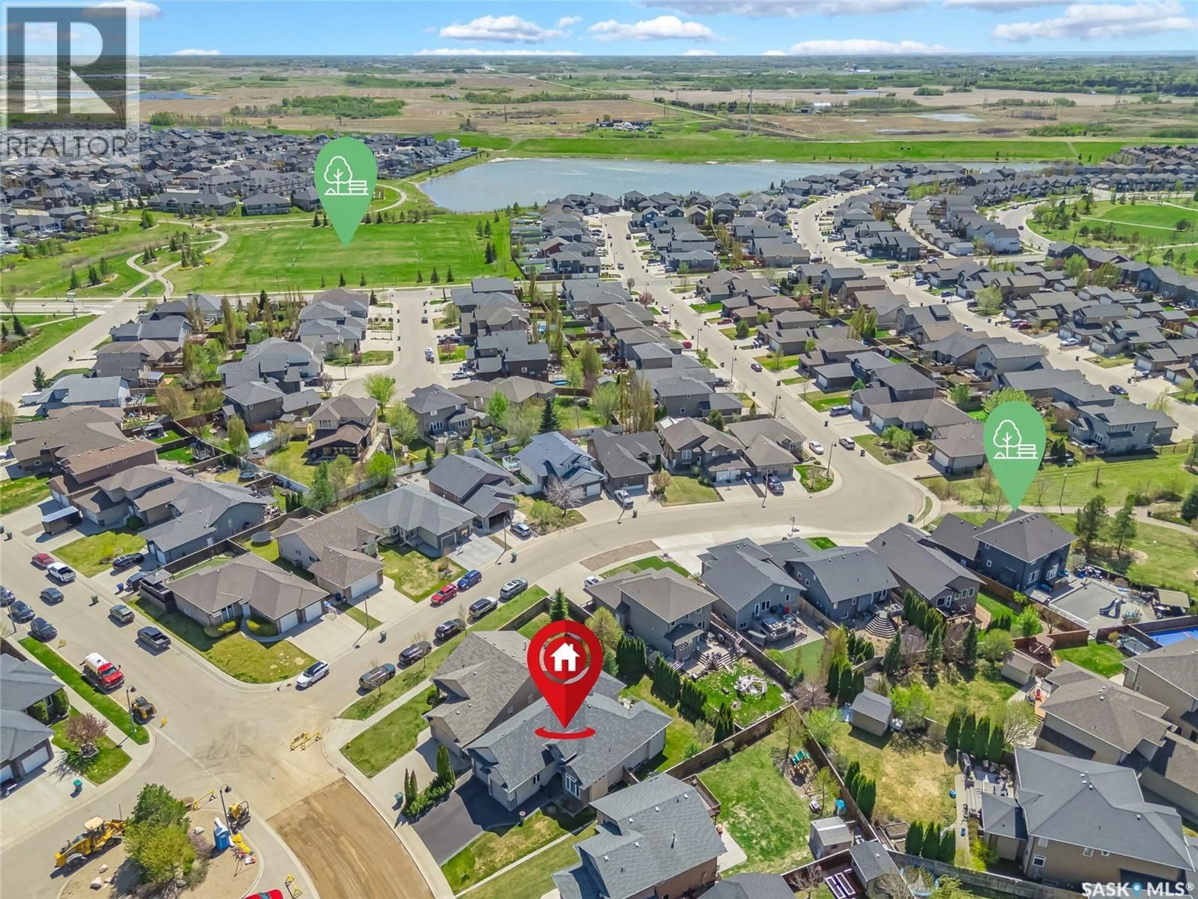 A pic from outside/outdoor area/front of a property/back of a property/a pic from drone, street for 142 ASSALY STREET, Saskatoon Saskatchewan S7T0E4