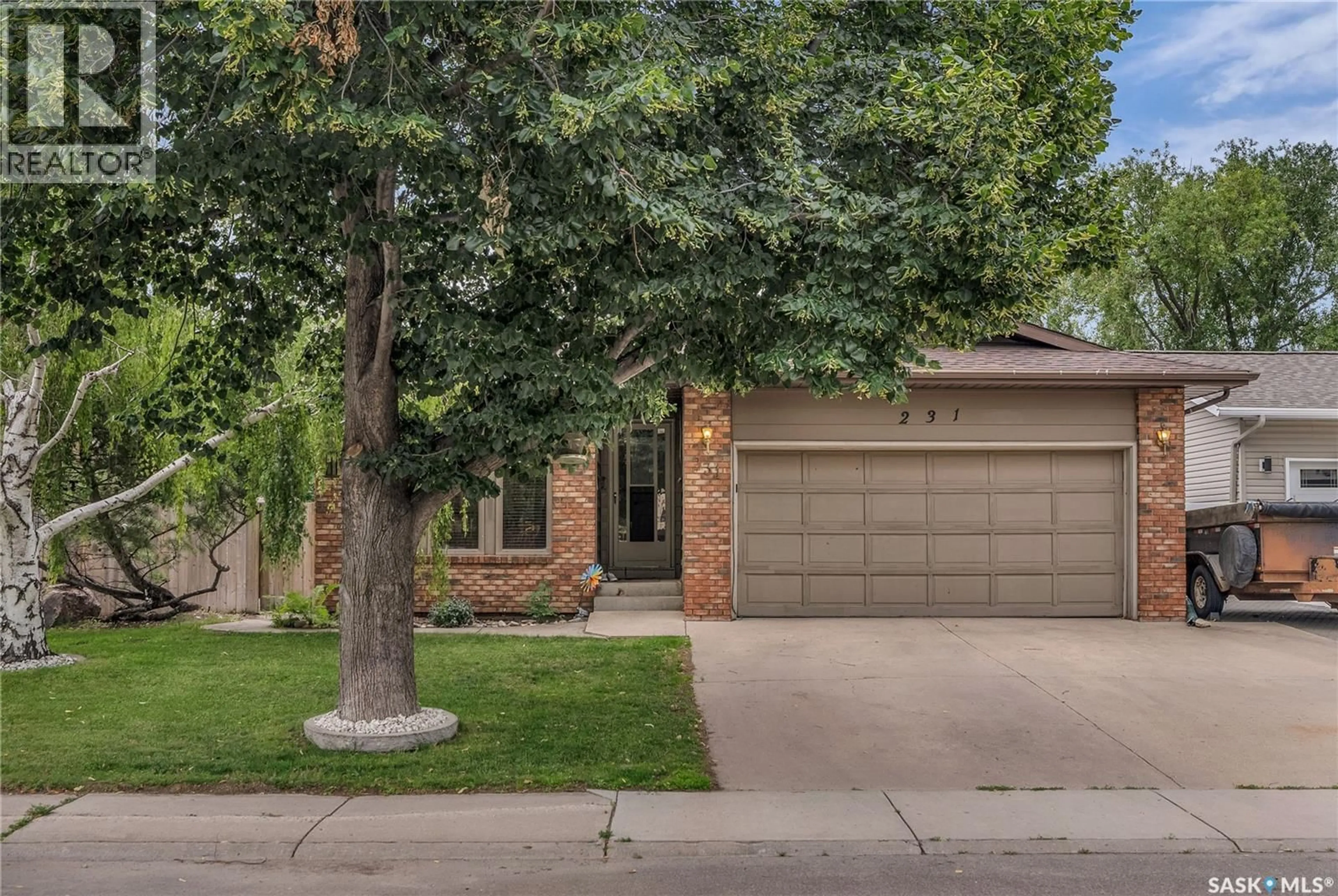 Home with brick exterior material, street for 231 BENESH CRESCENT, Saskatoon Saskatchewan S7K6L5