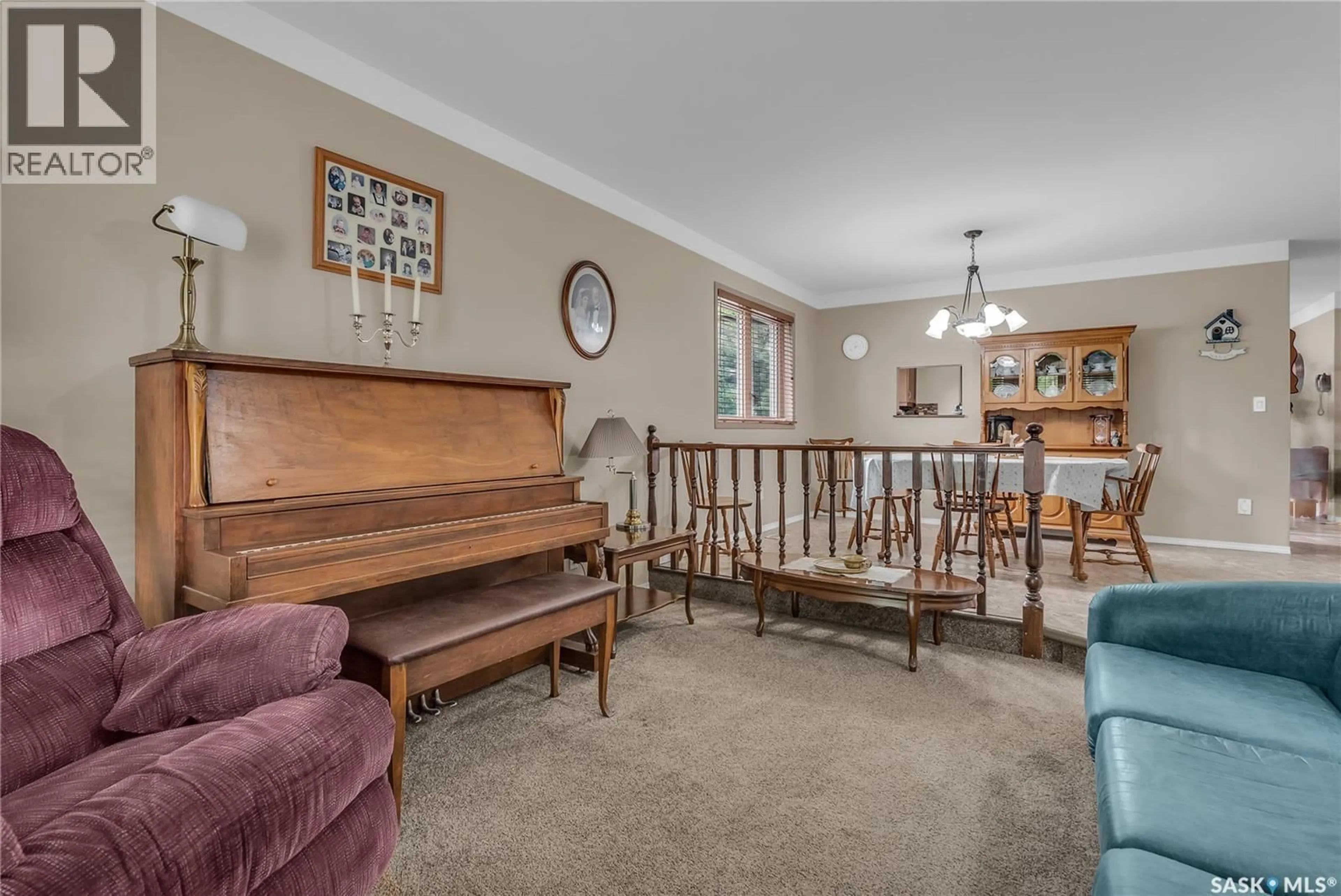 Living room with furniture, unknown for 231 BENESH CRESCENT, Saskatoon Saskatchewan S7K6L5