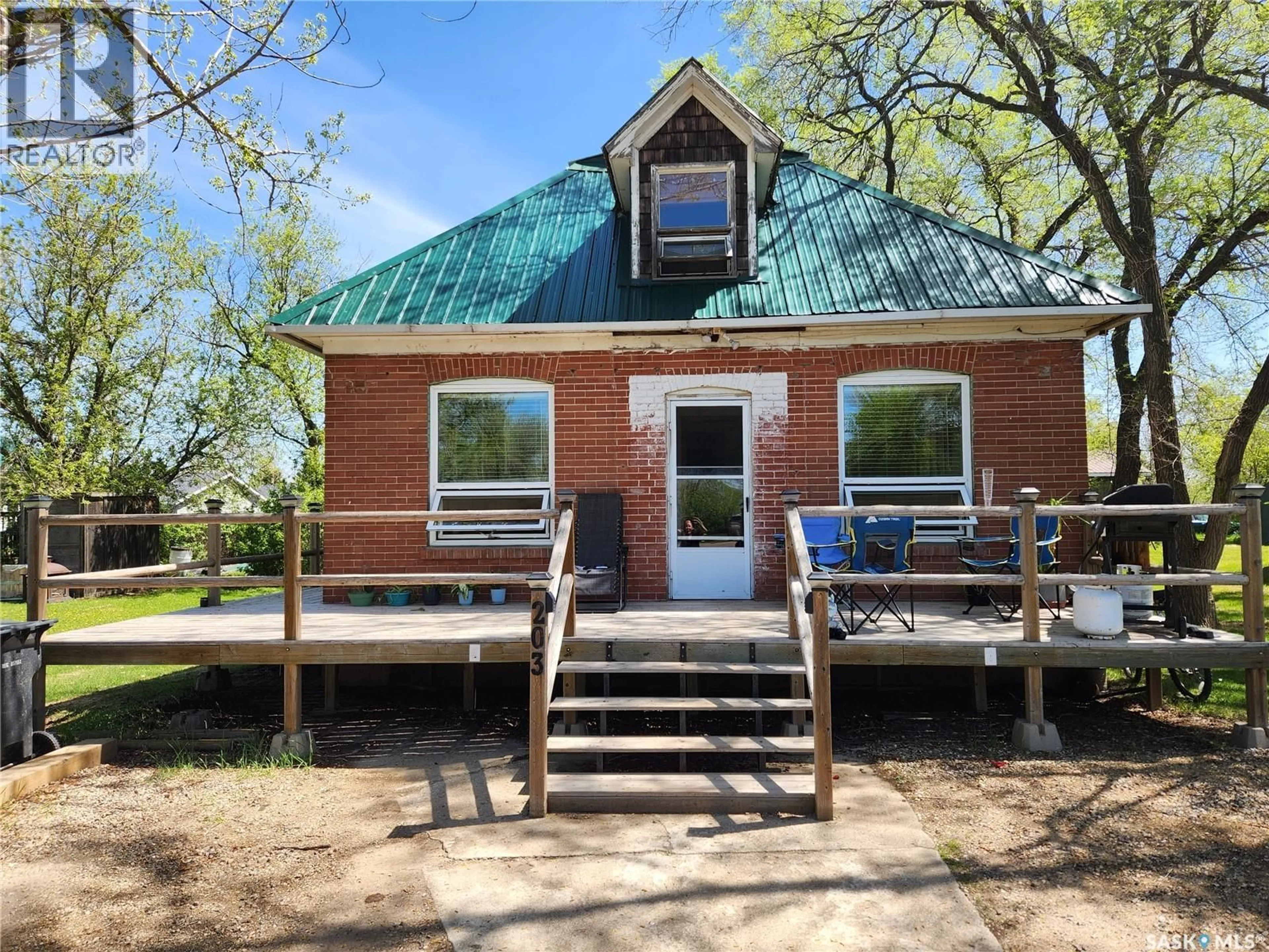 Home with brick exterior material, building for 203 BELFAST STREET, North Portal Saskatchewan S0C1W0