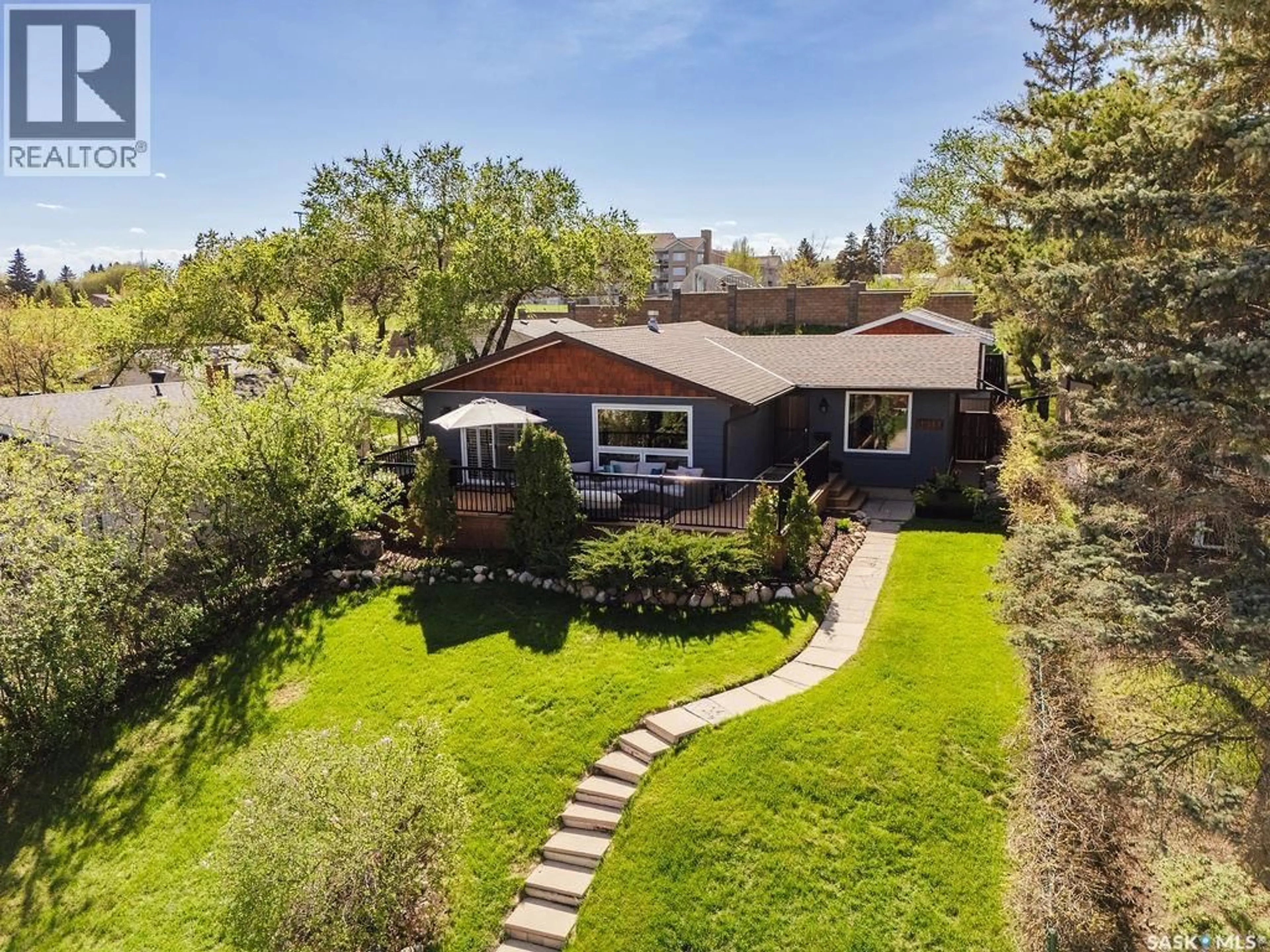 A pic from outside/outdoor area/front of a property/back of a property/a pic from drone, street for 1925 PEMBINA AVENUE, Saskatoon Saskatchewan S7K1C4