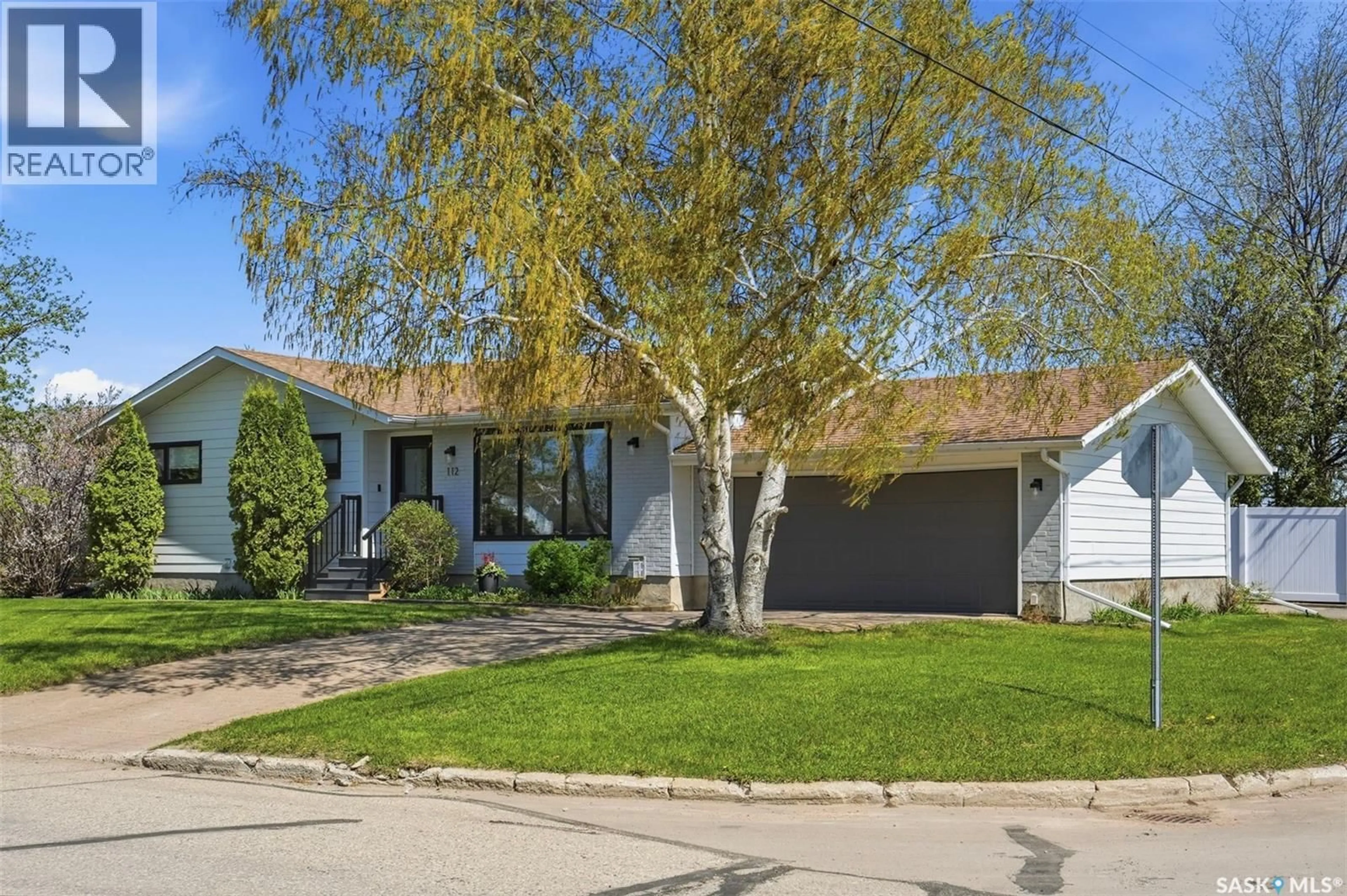 Home with vinyl exterior material, street for 112 8TH AVENUE, Watrous Saskatchewan S0K4T0