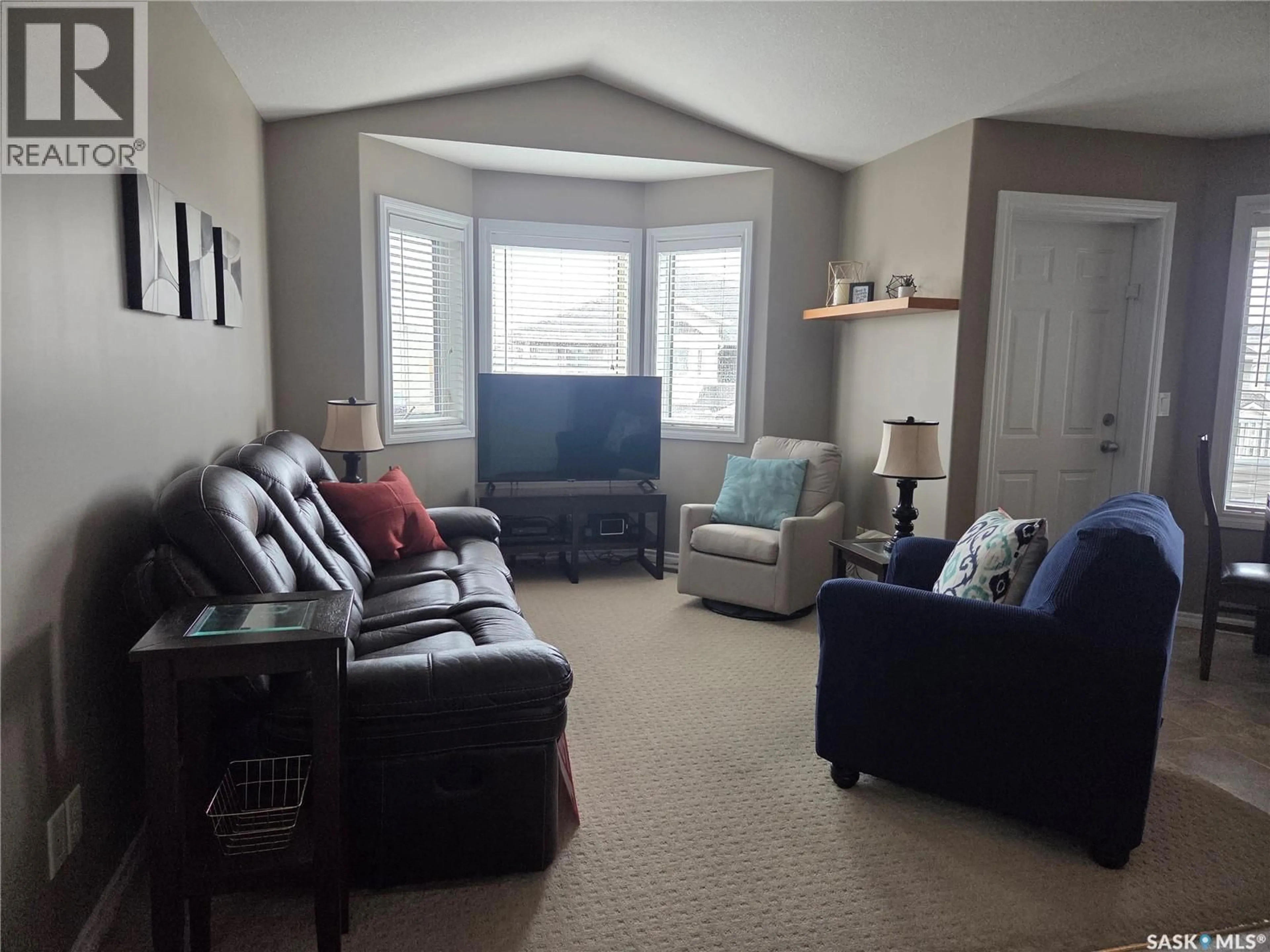Living room with furniture, unknown for 4144 BUCKINGHAM DRIVE, Regina Saskatchewan S4V3A9
